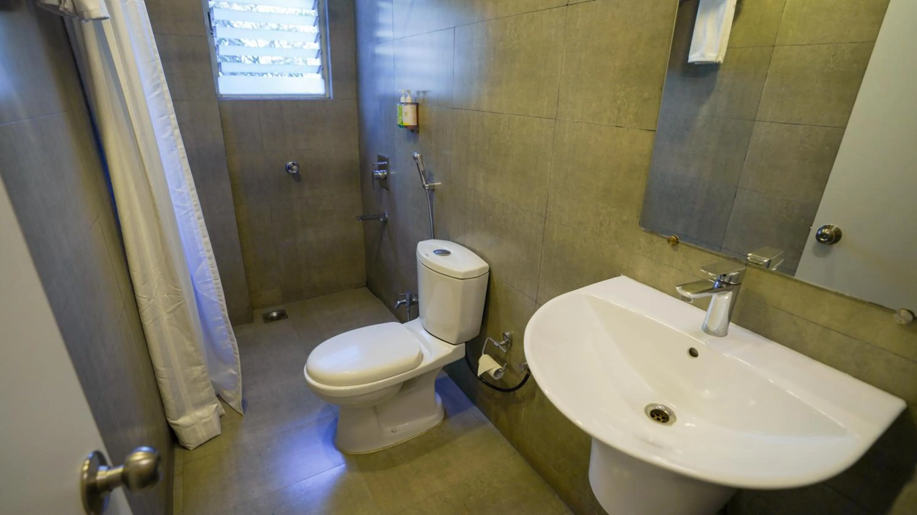 Bathroom in Bloom Hotel - Magarpatta