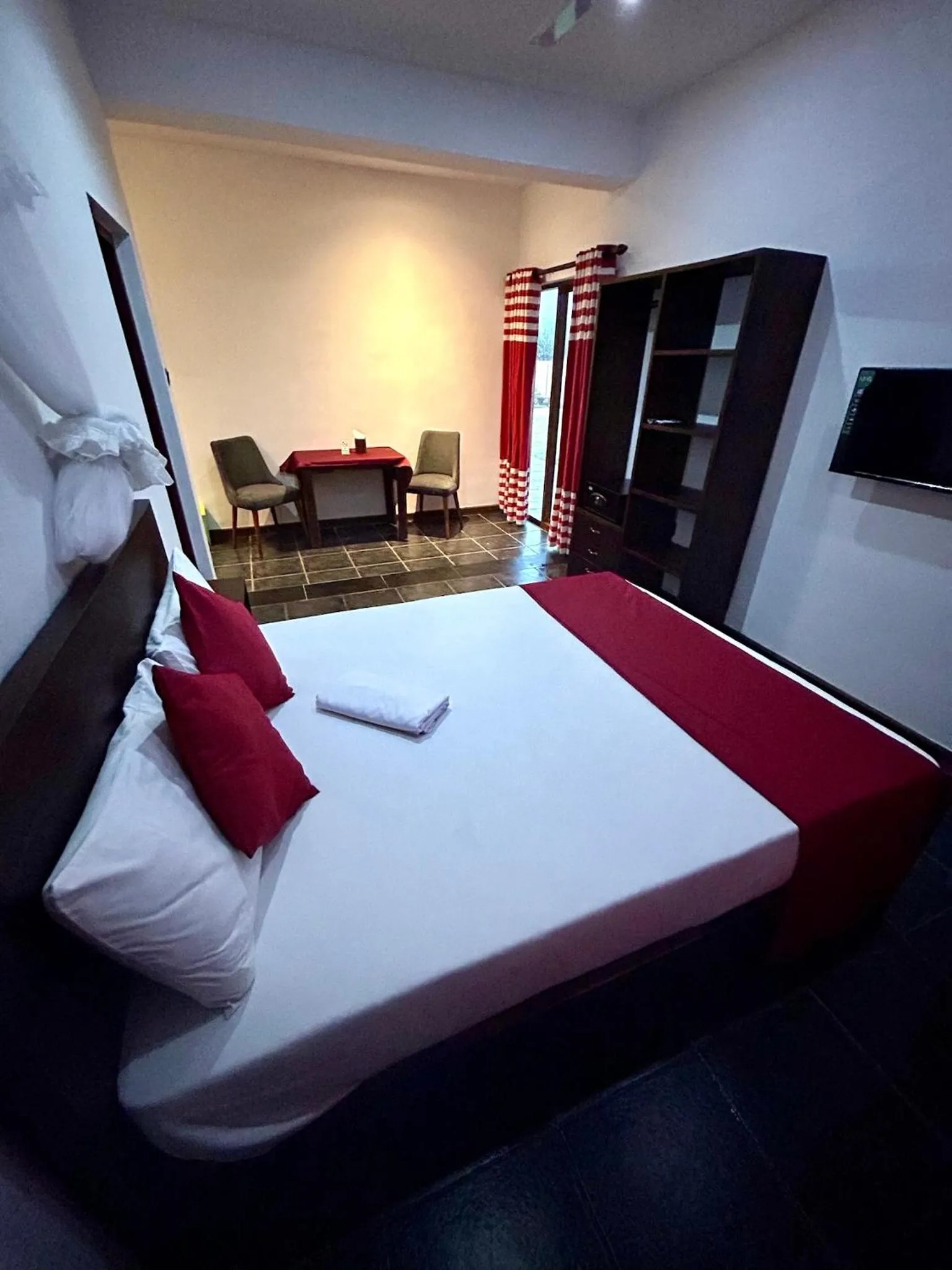 Bed in Reef Bungalow Hotel