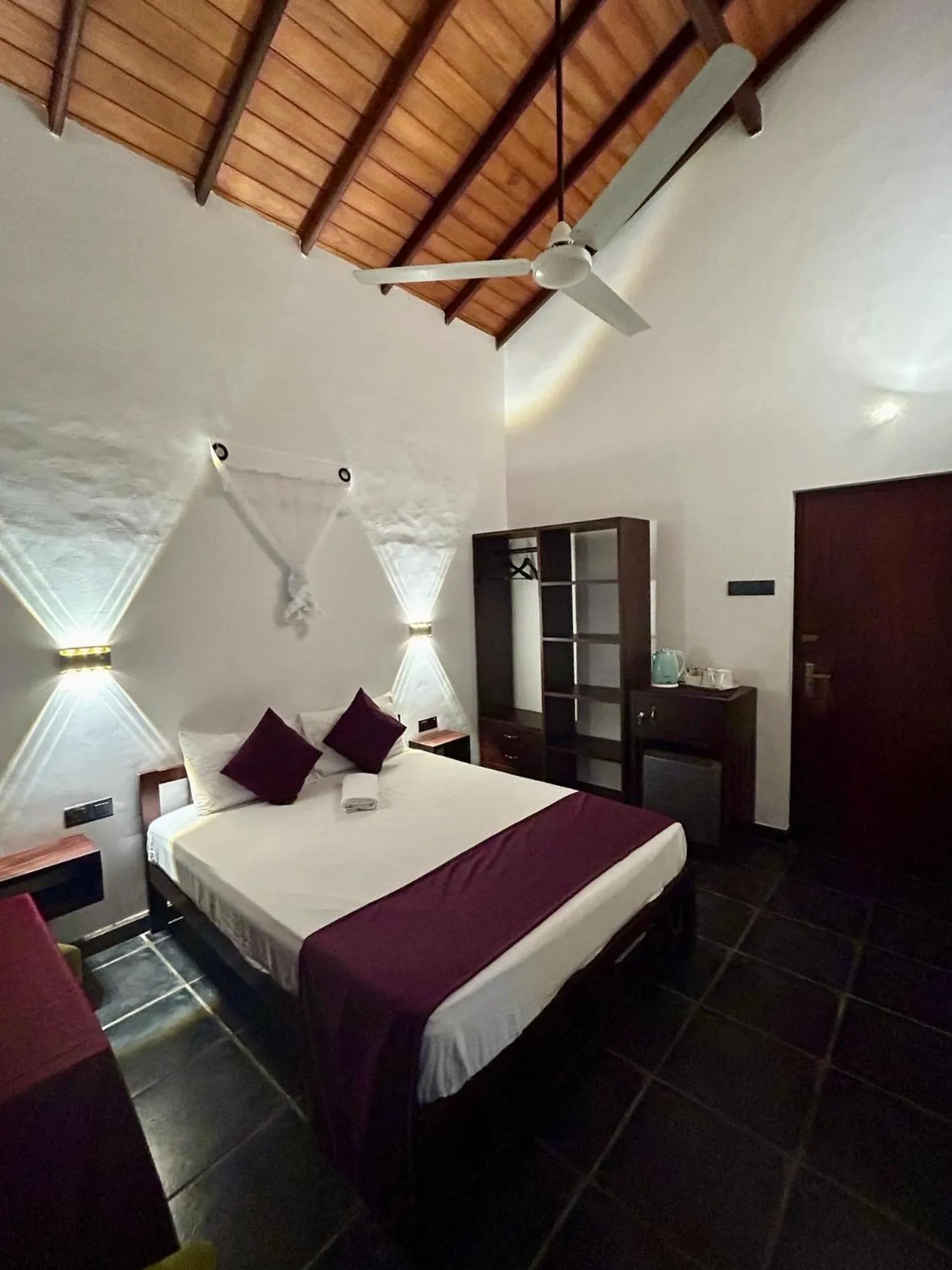 Bed in Reef Bungalow Hotel