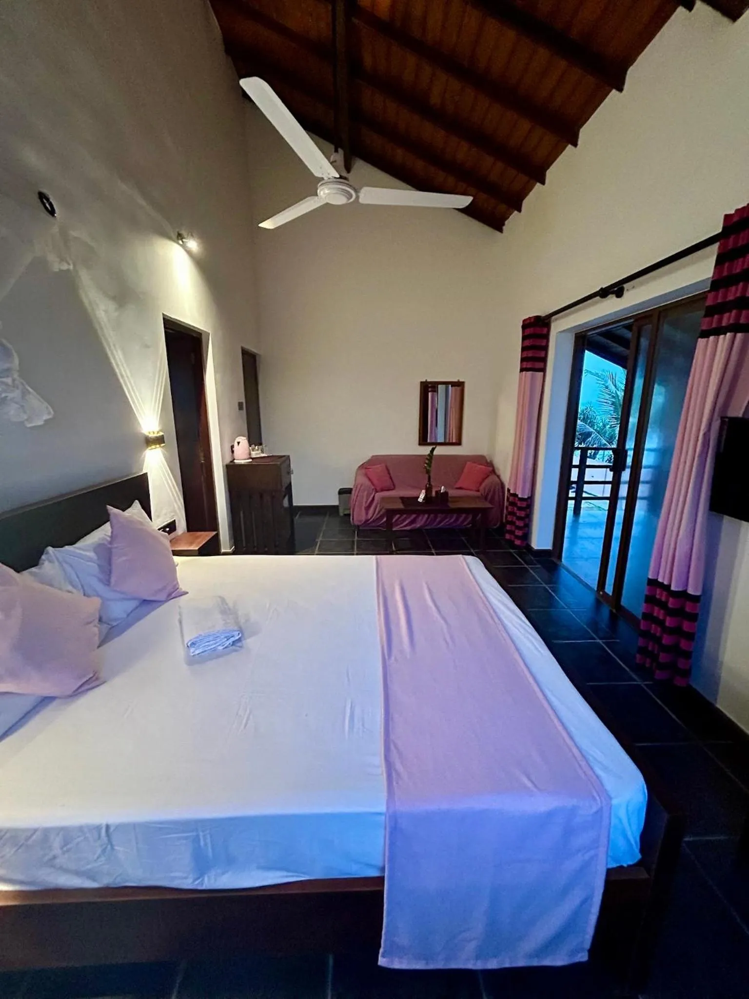 Bed in Reef Bungalow Hotel