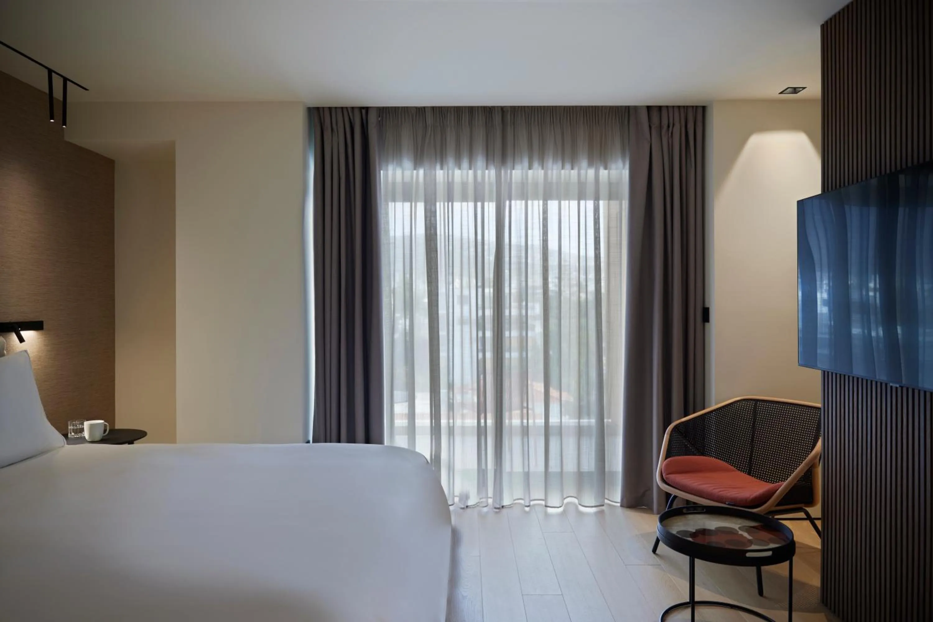 Bed in Dusit Suites Hotel Athens