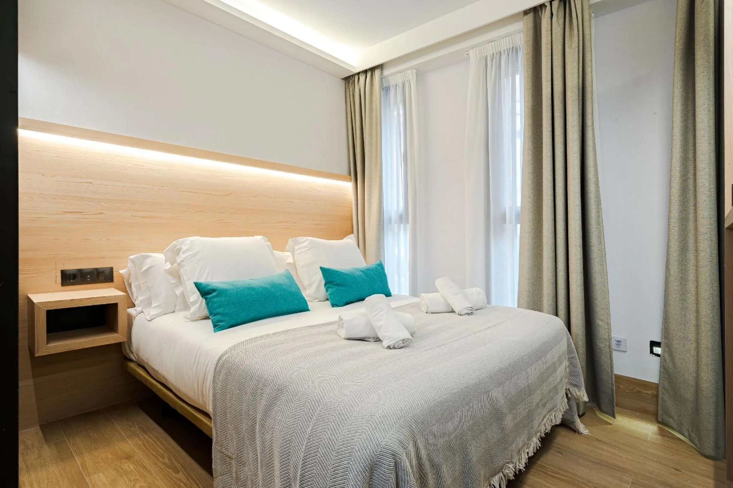 Bed in Feelathome Ventas Suites