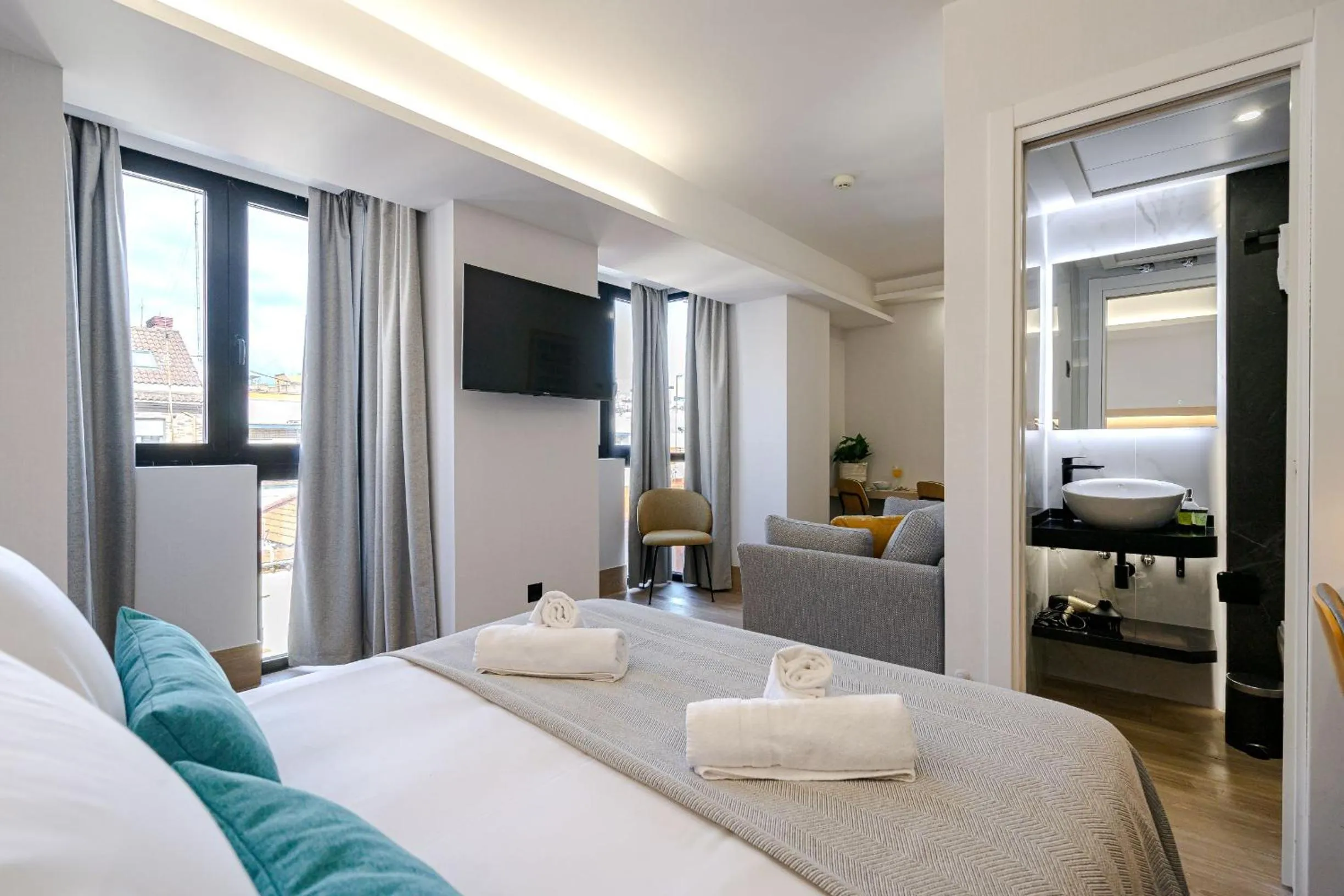 Bed in Feelathome Ventas Suites