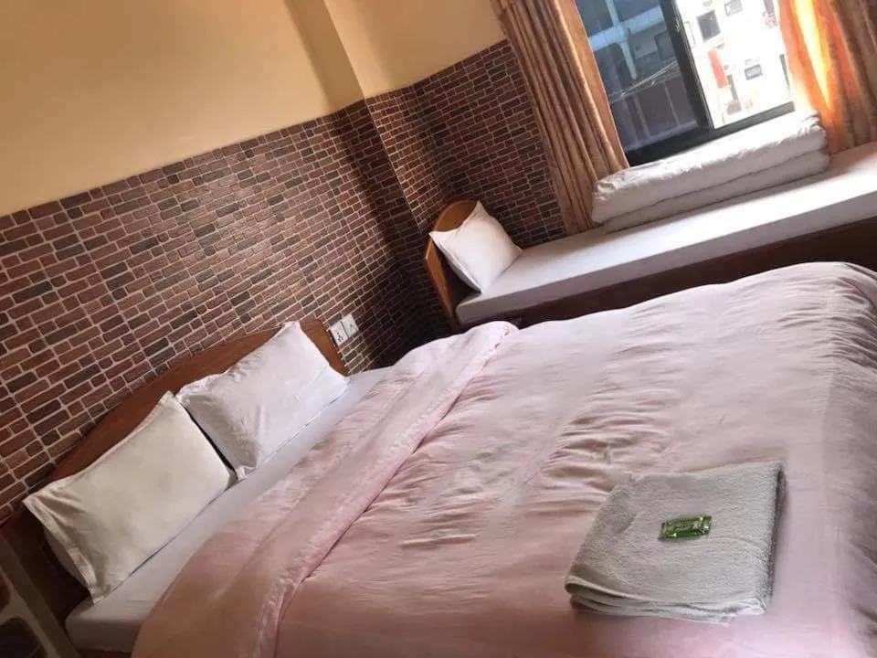 Bed in Hotel Center Inn Lake