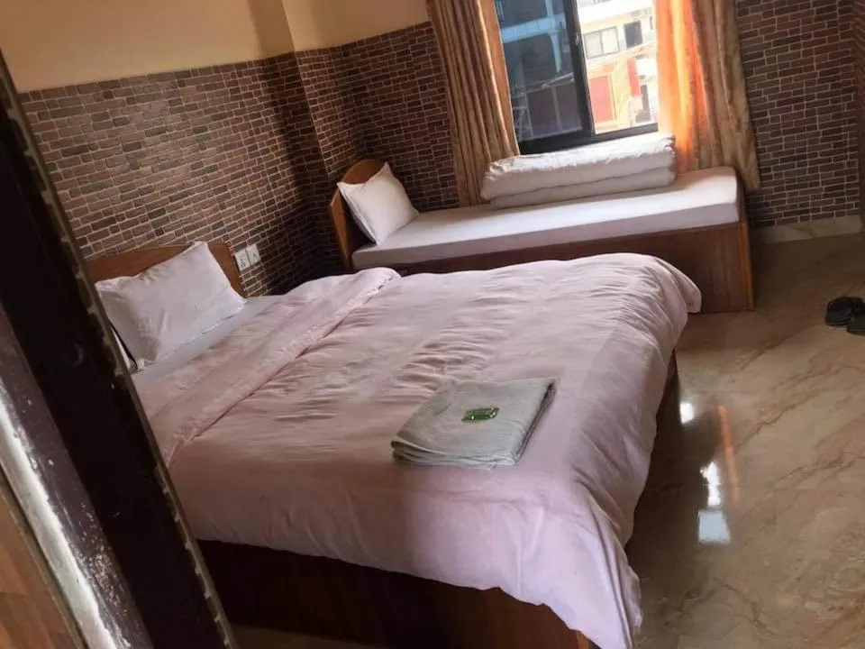 Bed in Hotel Center Inn Lake