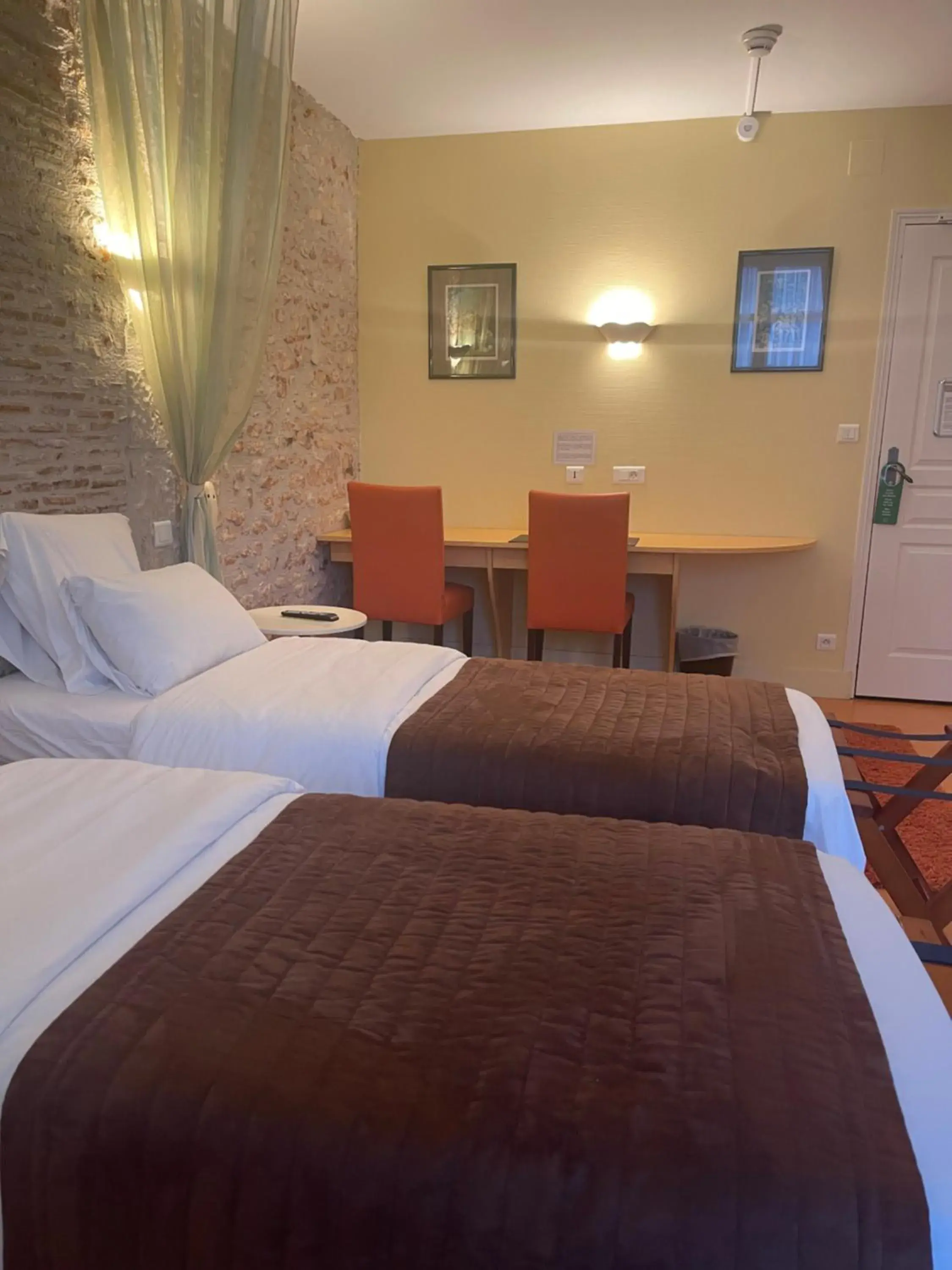 King Room with Two King Beds in Le Grand Monarque Donzy King Room with Two King Beds in Le Grand Monarque Donzy