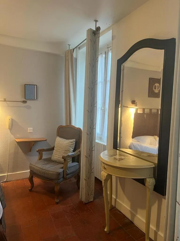 Bed in Le Grand Monarque Donzy