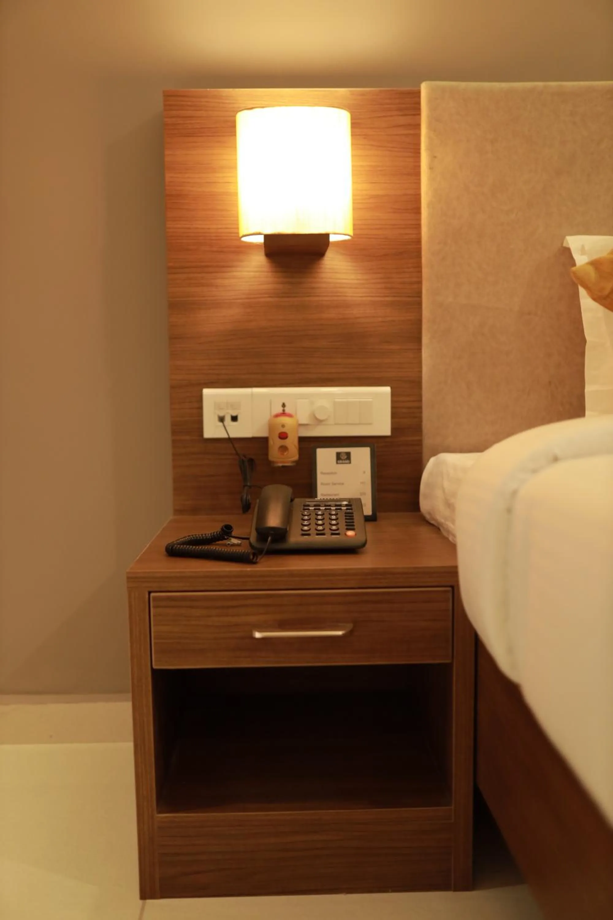 Bedroom, Bed in Hotel Kottayam Grand