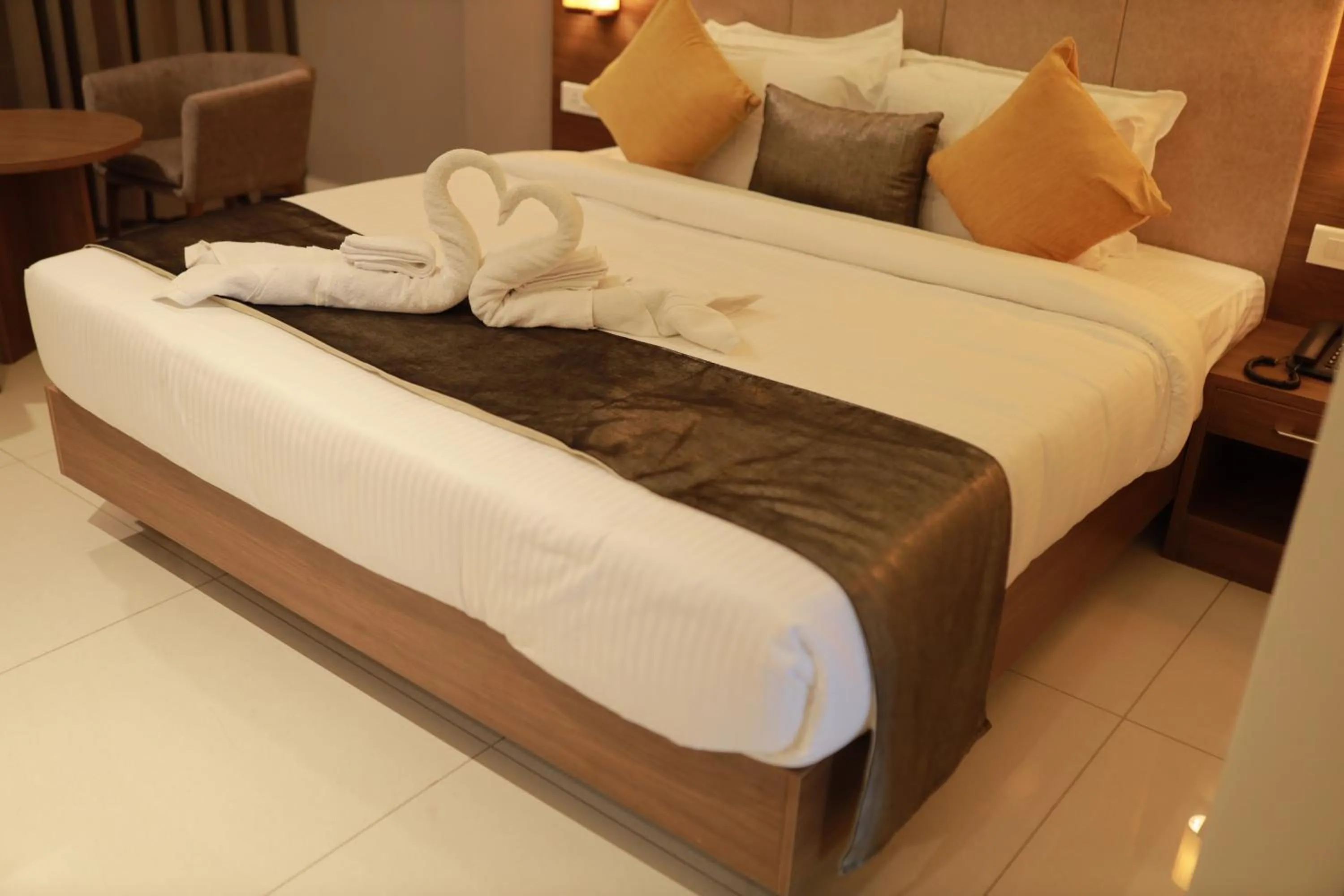 Bedroom, Bed in Hotel Kottayam Grand