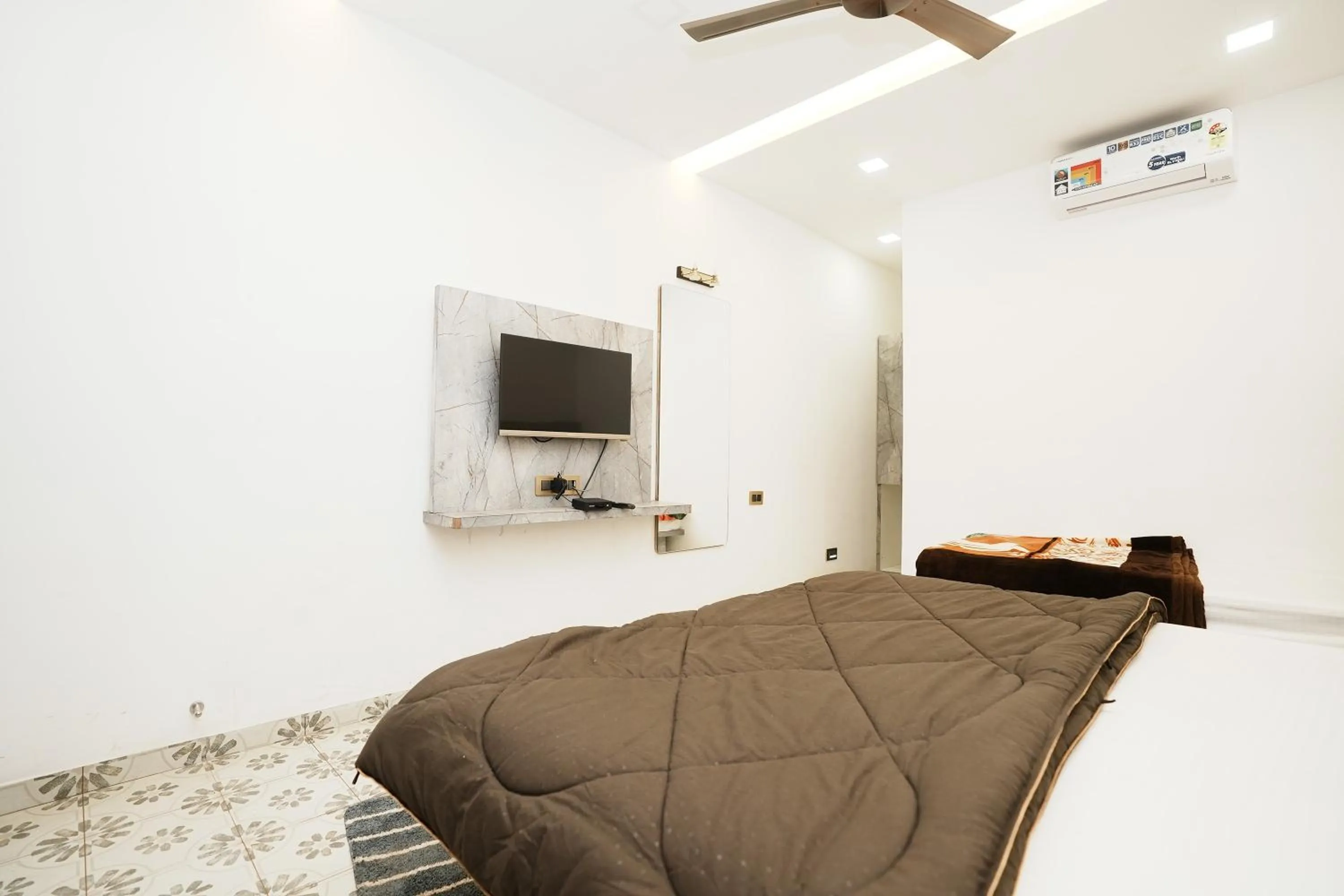 Bedroom, Bed in Dwarka Lawns Cottages