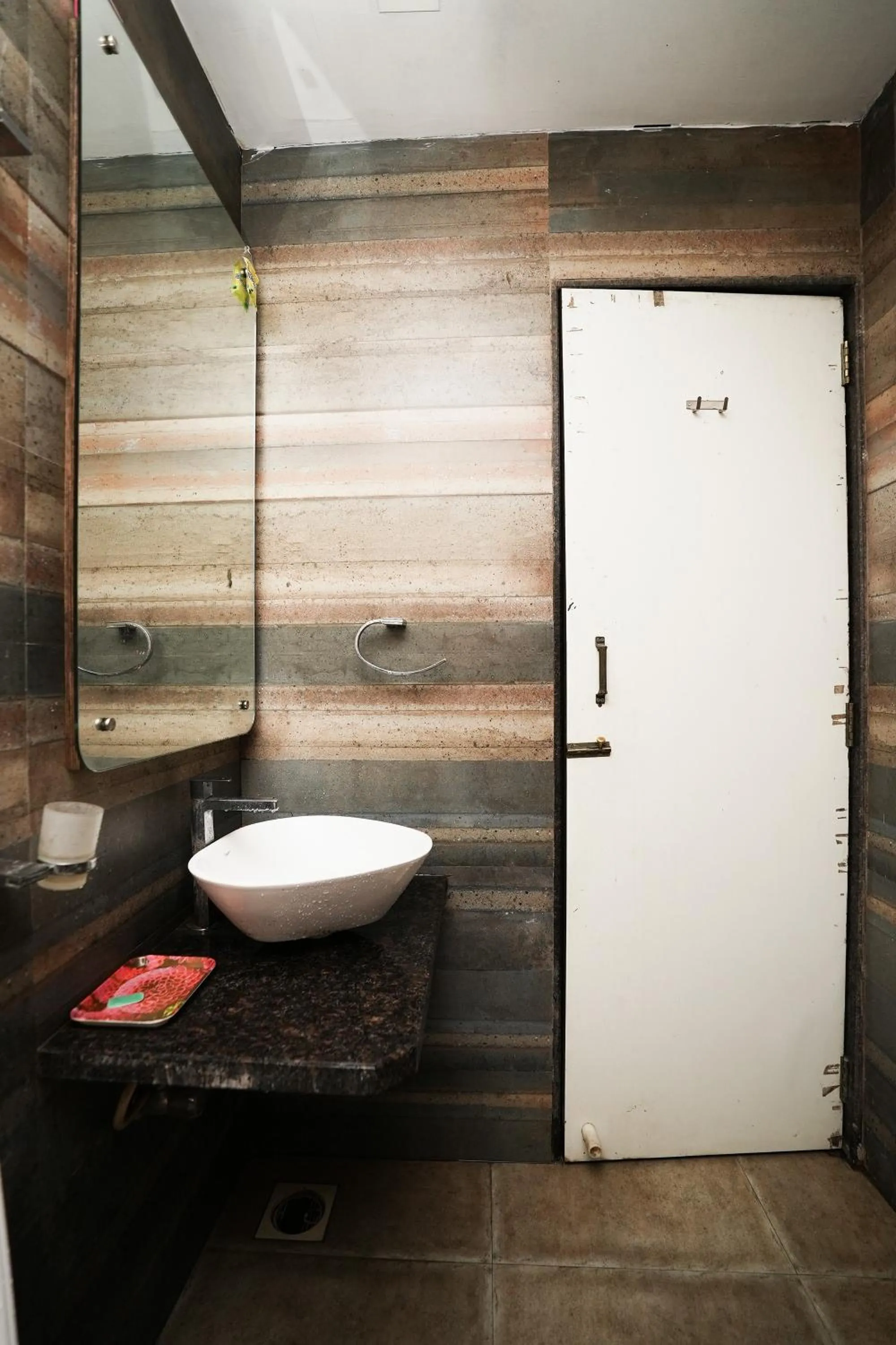 Bathroom in Dwarka Lawns Cottages