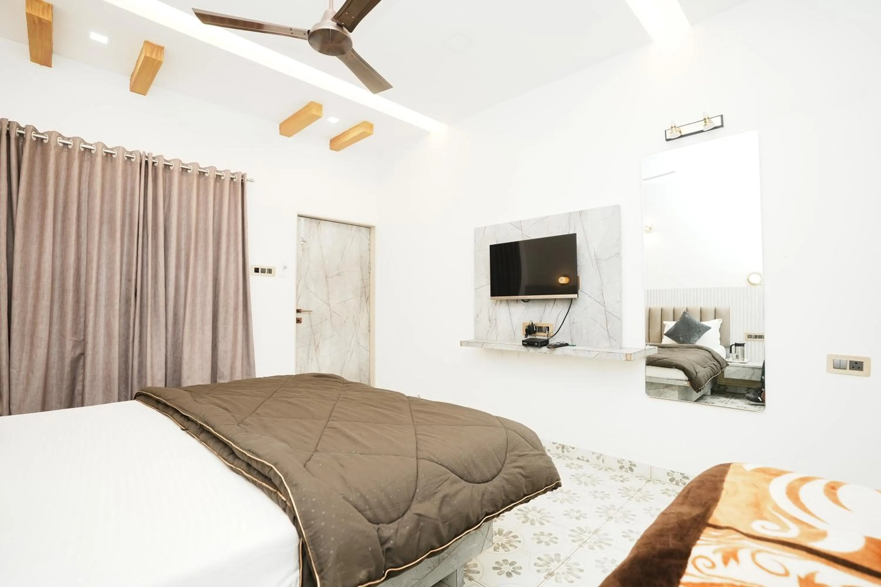 Bedroom, Bed in Dwarka Lawns Cottages