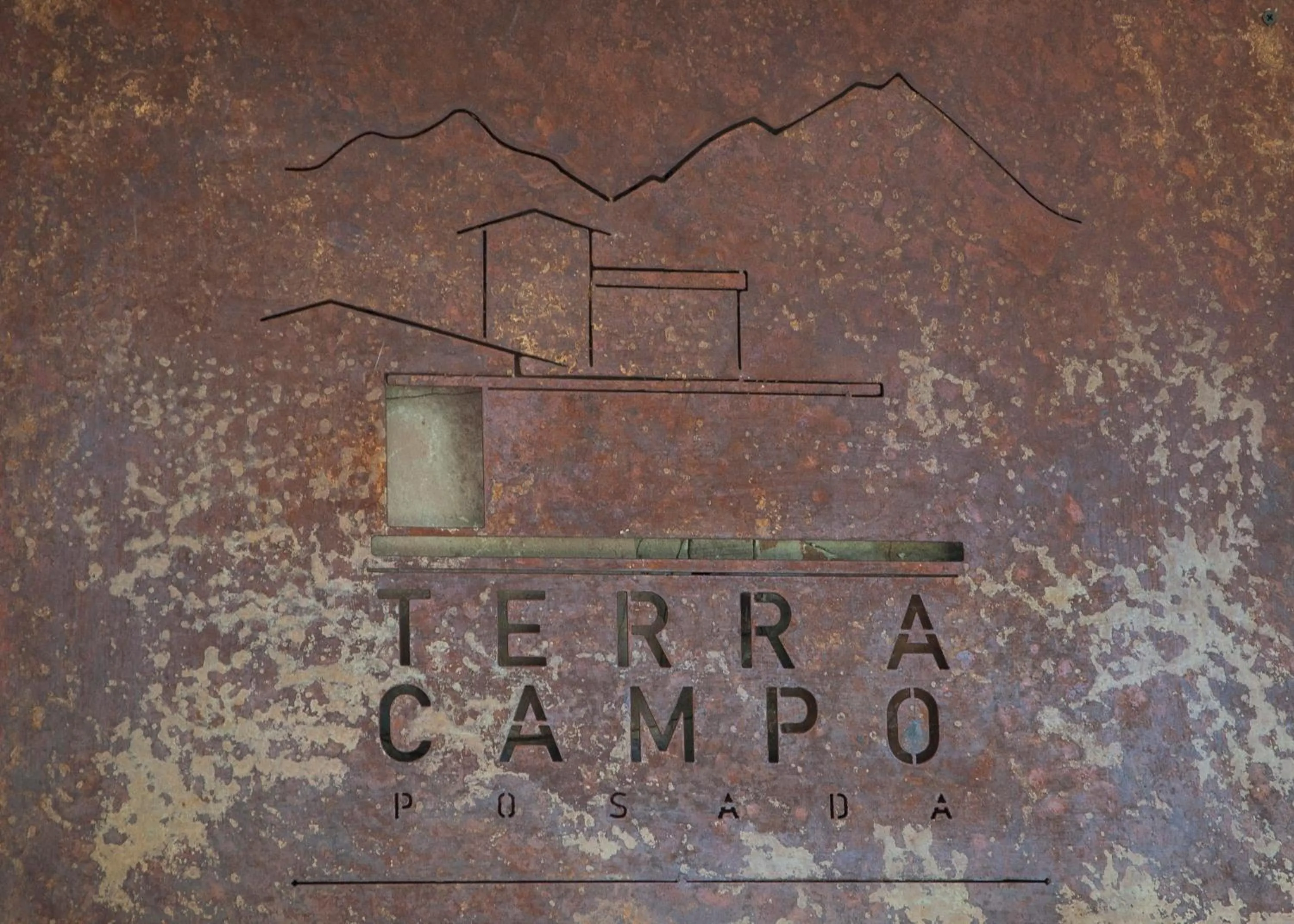 Property logo or sign in Terra Campo Posada