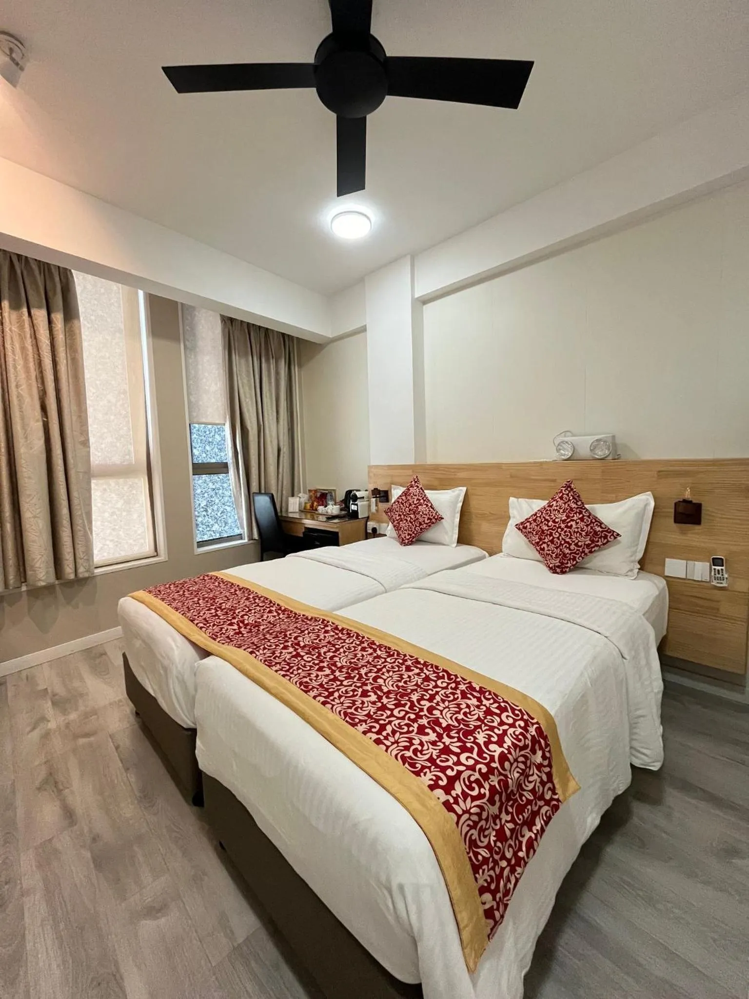 Bed in Tourist Inn Grand