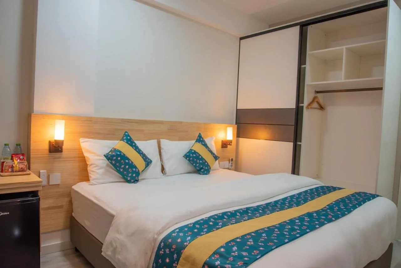 Bed in Tourist Inn Grand