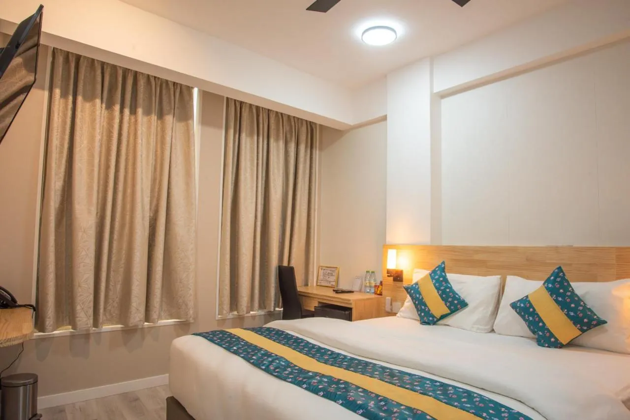 Bed in Tourist Inn Grand