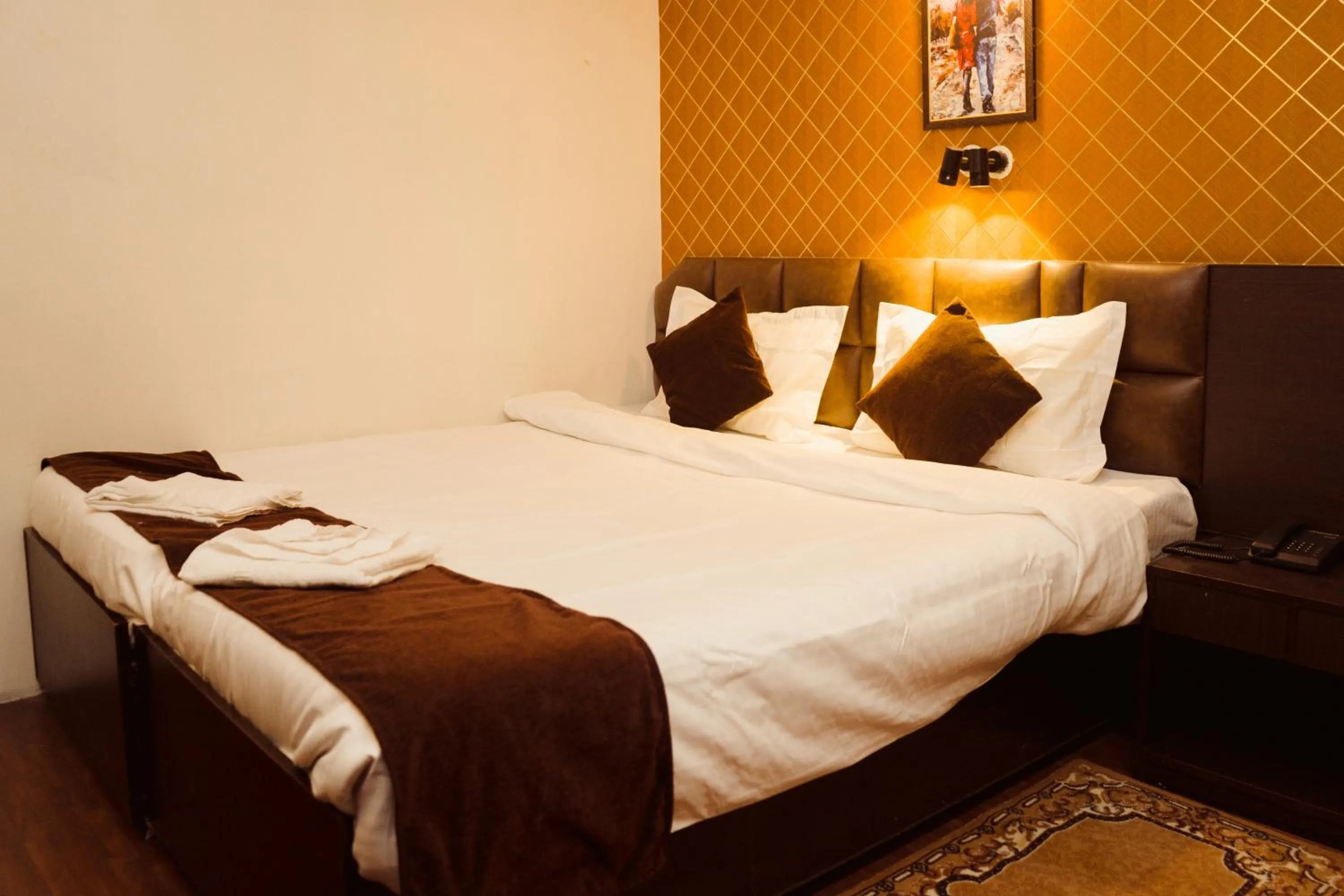 Bed in Hotel Siddhi Vinayak Regency, Mg Marg