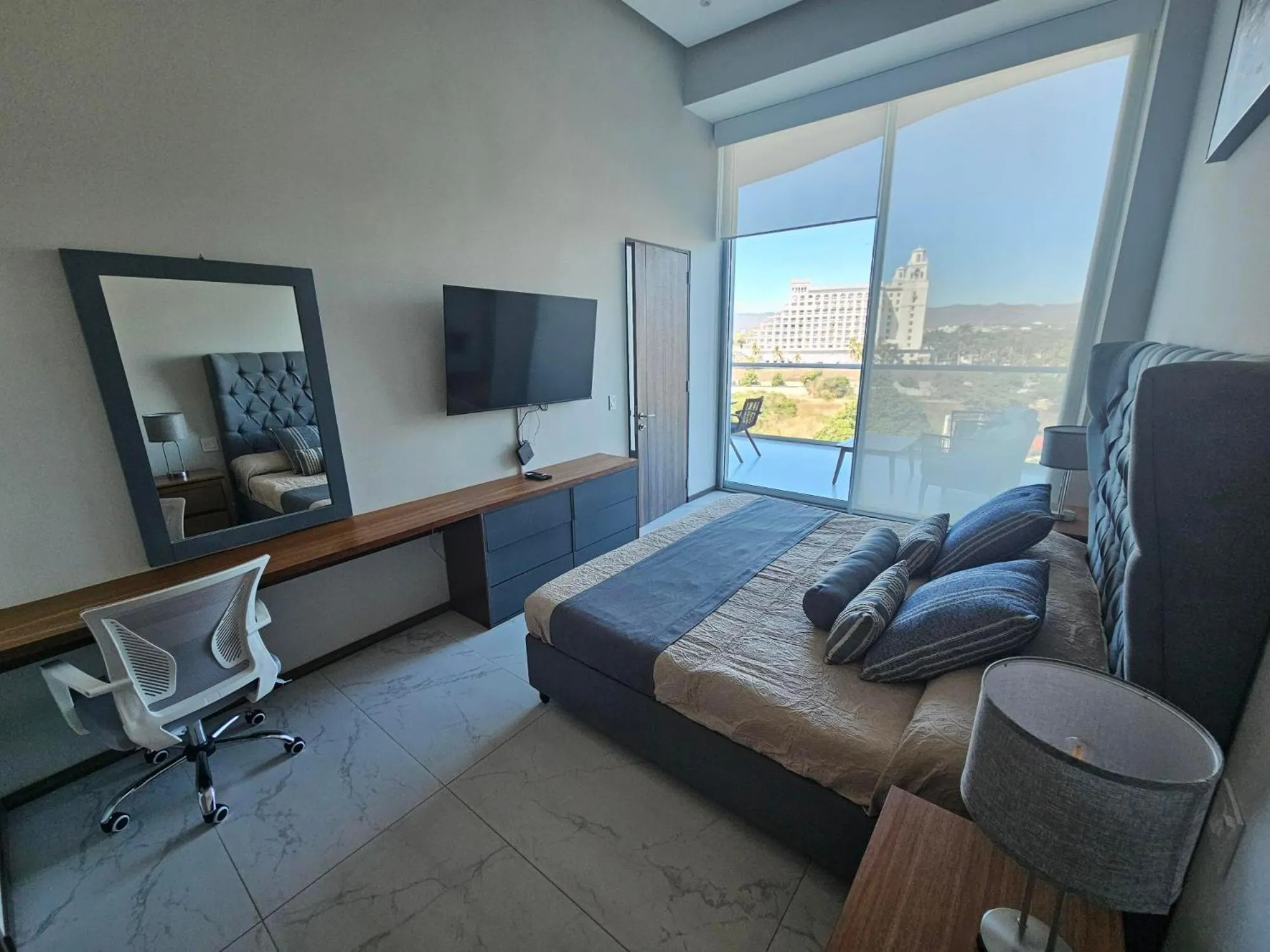 Bedroom in Maritima Front Beach Apartment