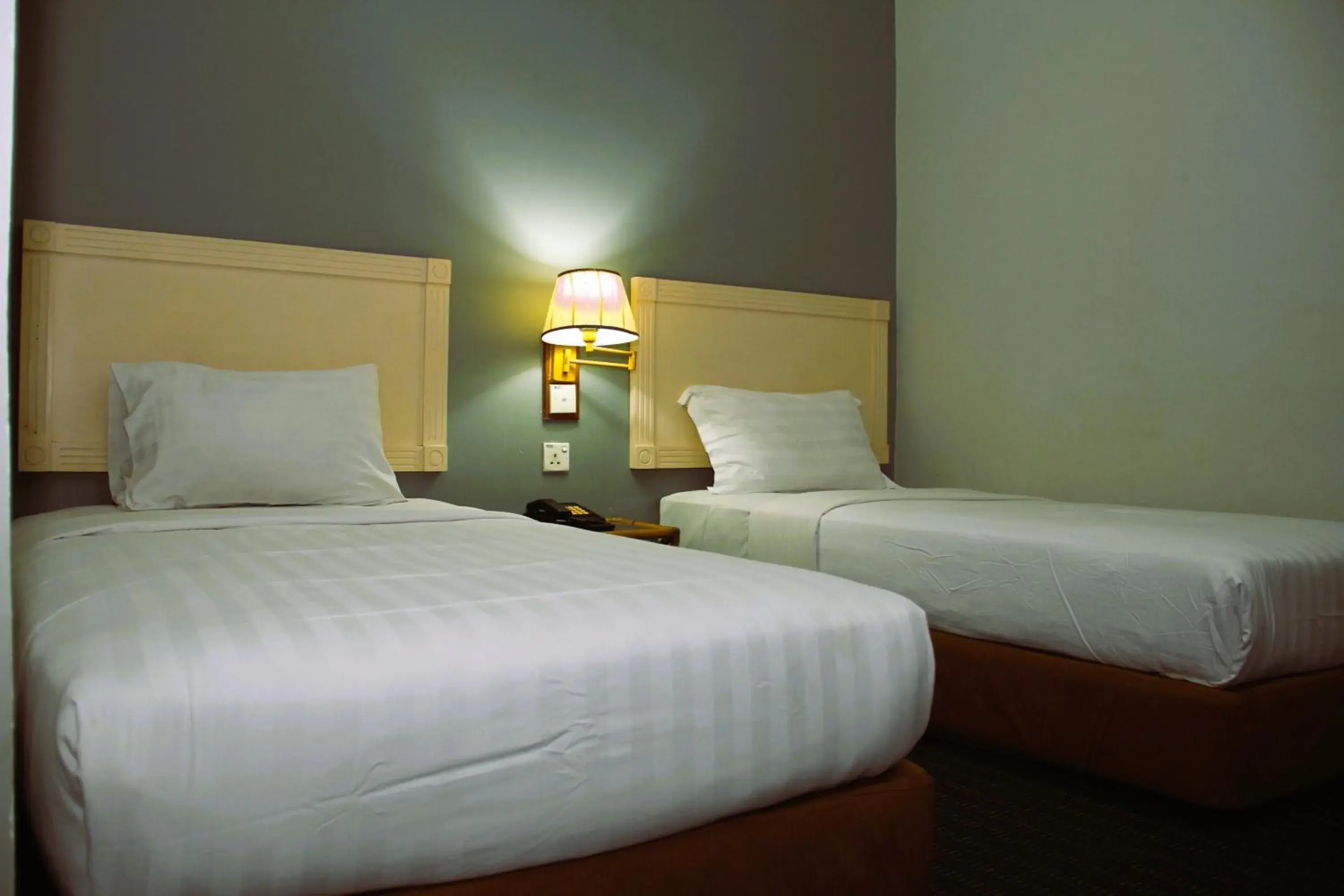 Bed in Sandakan Inn Bed in Sandakan Inn