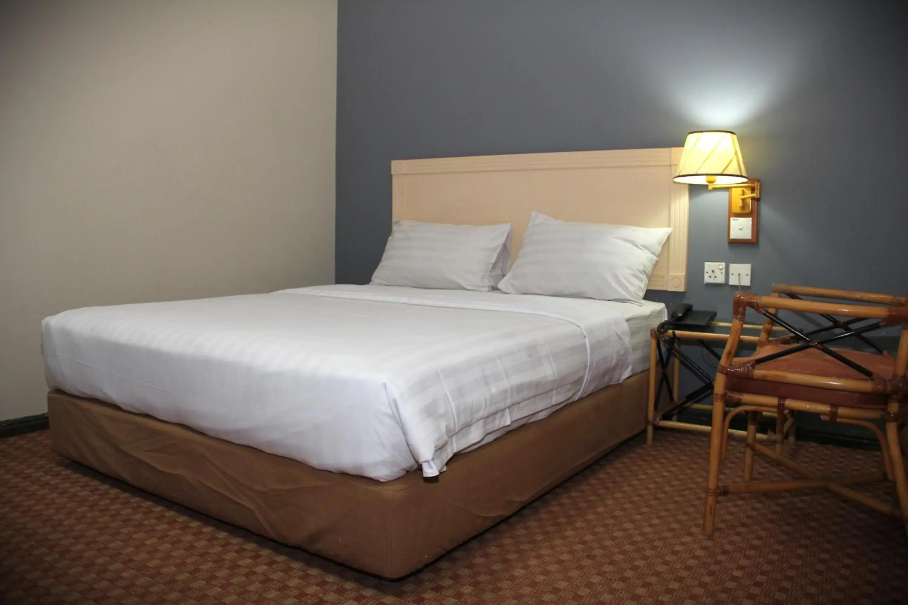 Bed in Sandakan Inn Bed in Sandakan Inn