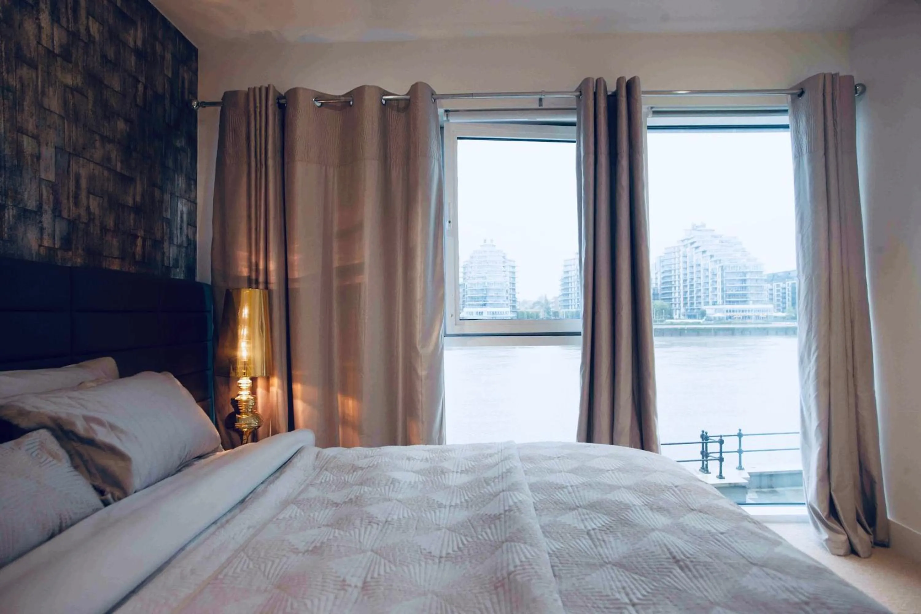 Bedroom, Bed in Thames riverside apartment in London