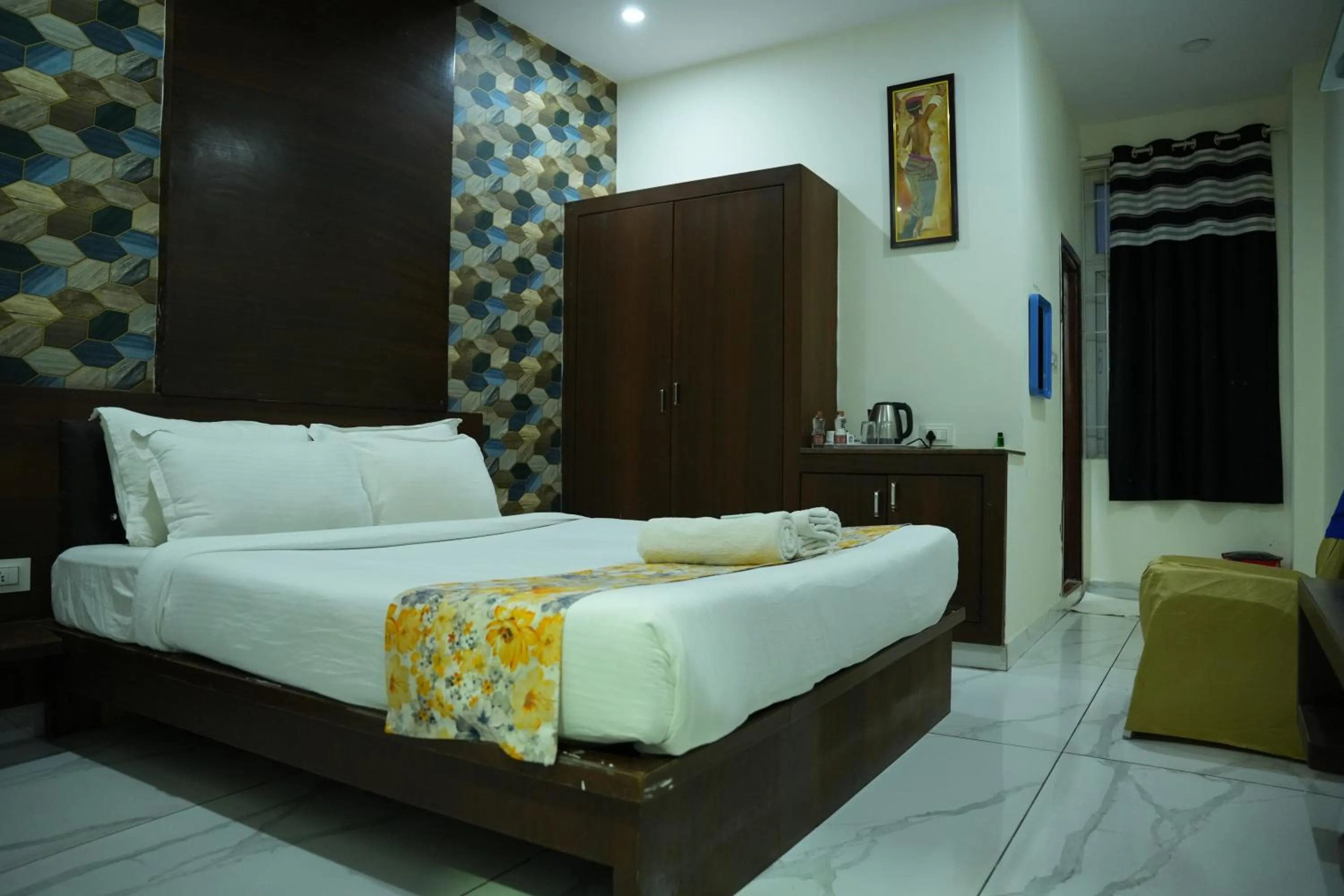 Photo of the whole room, Bed in Hotel Plaza Hyderabad Airport Zone