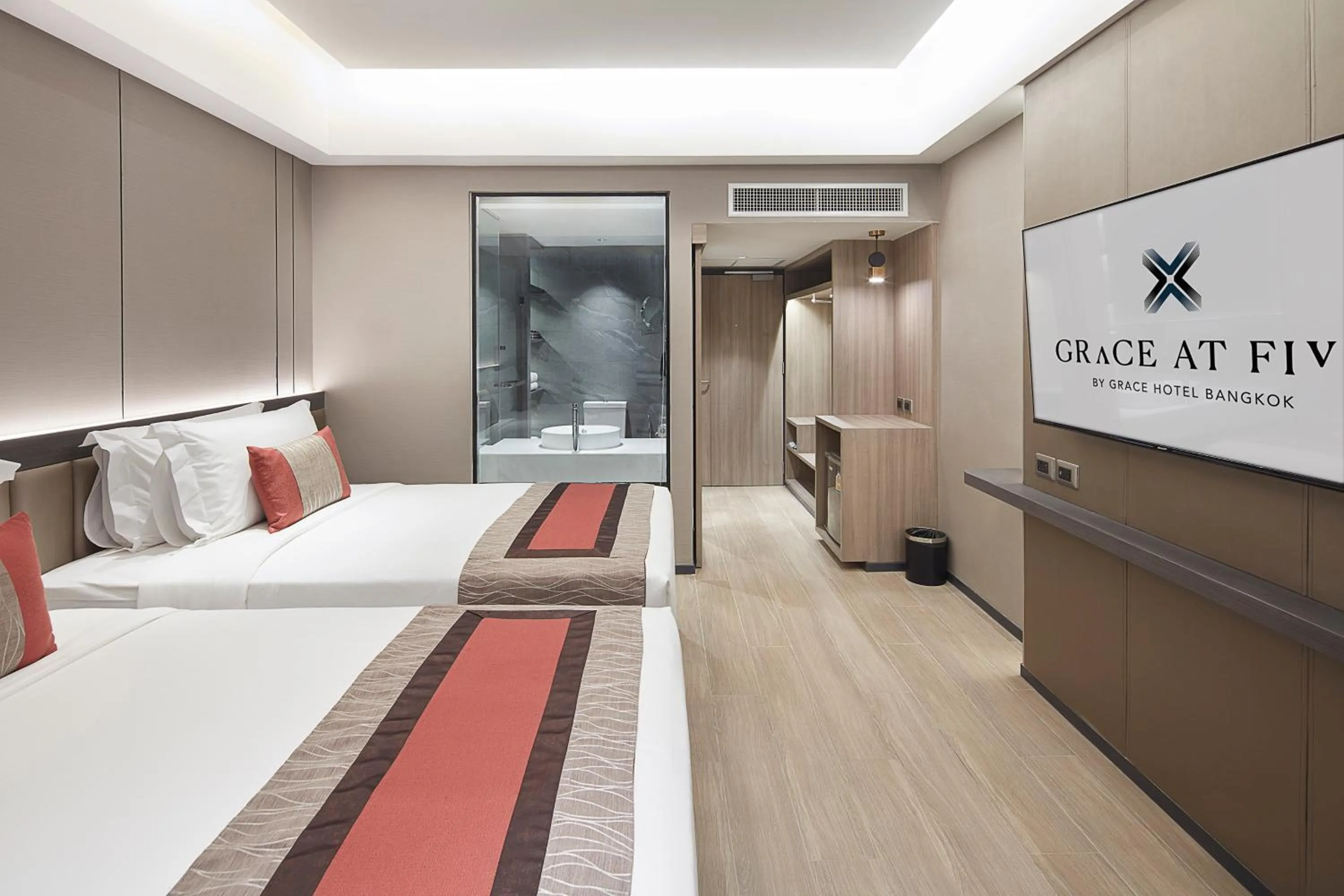 Bed in Grace At Five by Grace Hotel Bangkok