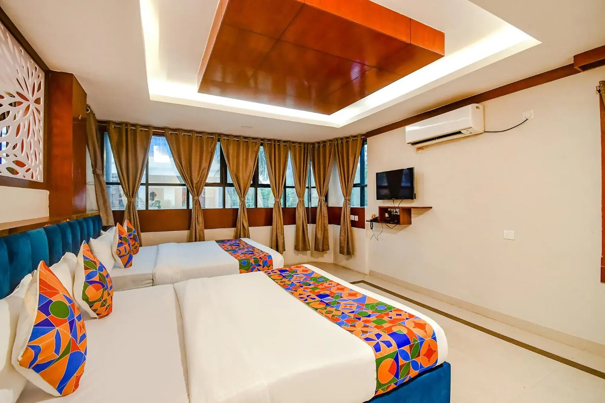 Communal lounge/ TV room in FabHotel Greenland Grand - Nr Kalinga Stadium Communal lounge/ TV room in FabHotel Greenland Grand - Nr Kalinga Stadium