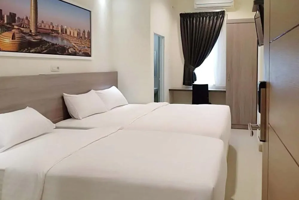 Bed in Twospaces Living at Maximus inn