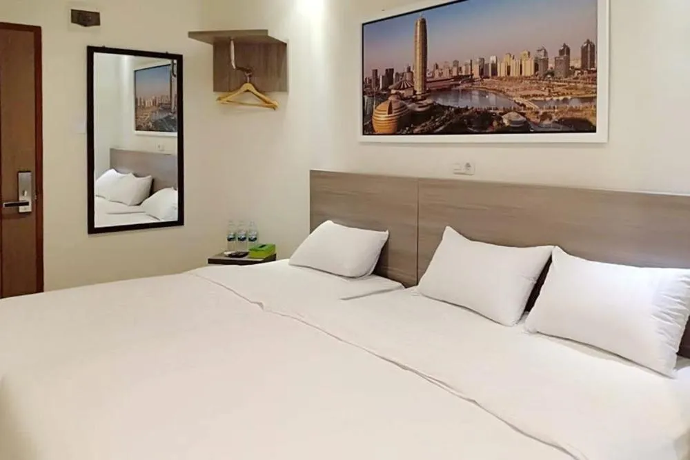 Bed in Twospaces Living at Maximus inn