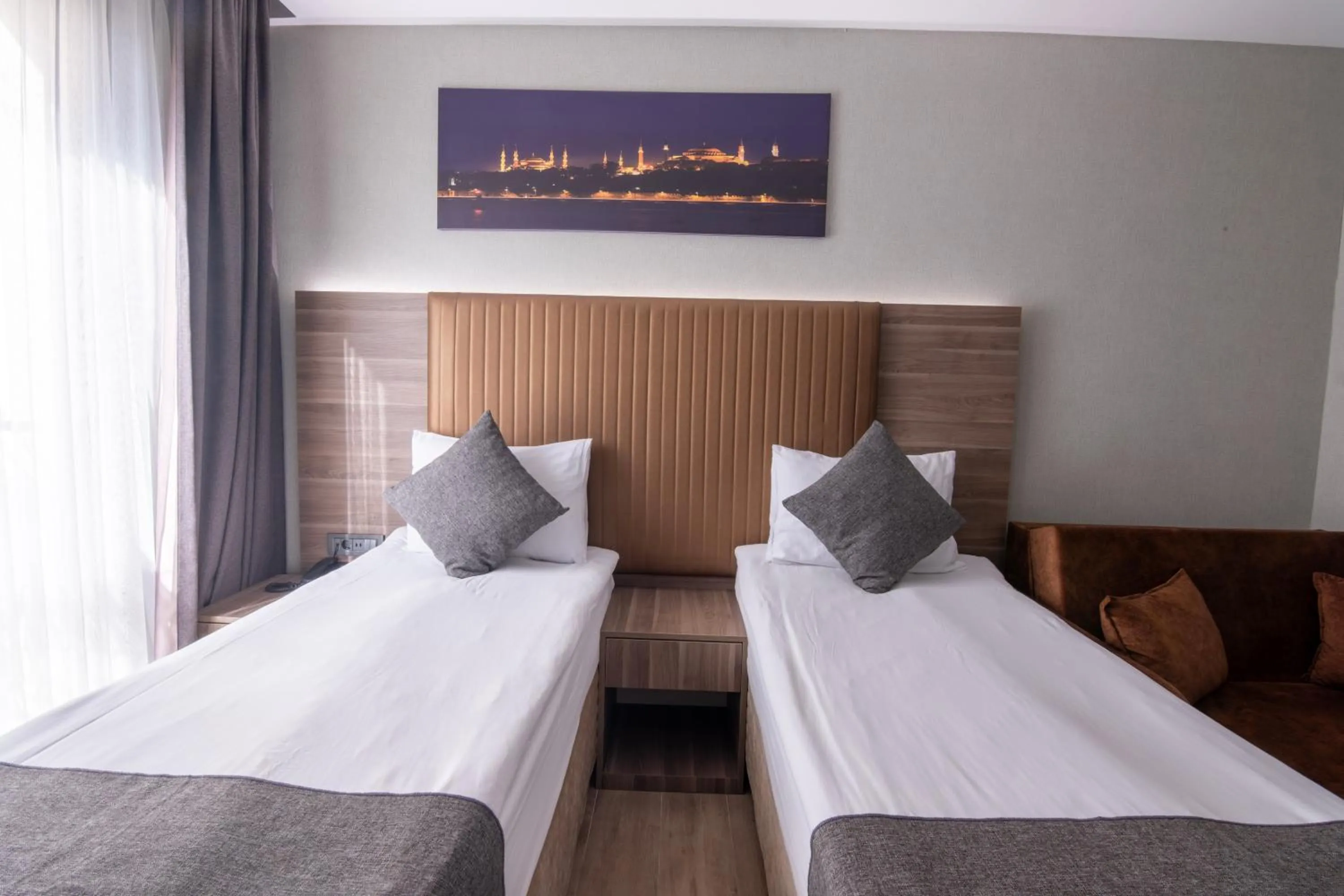 Bed in The Omiya Hotel