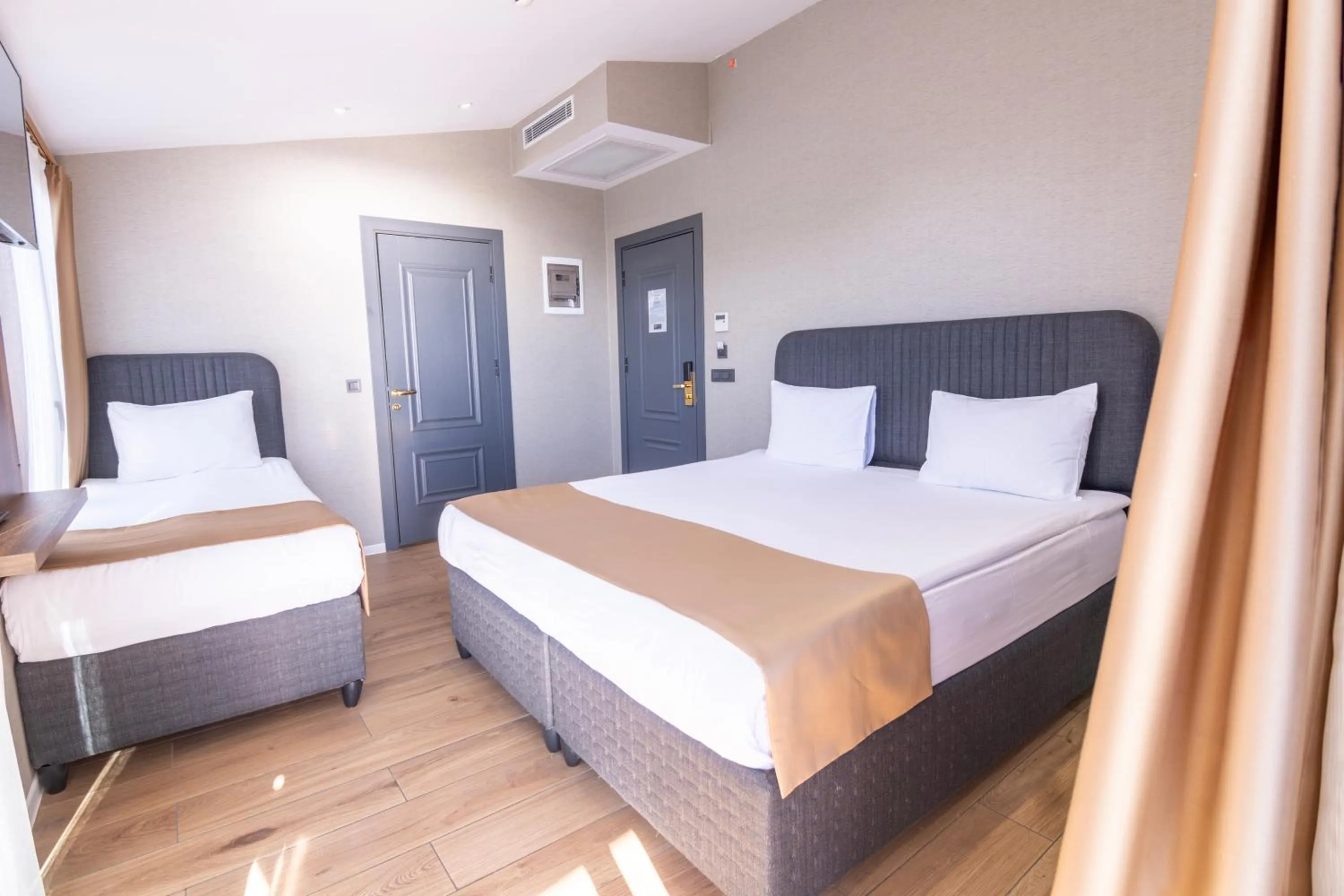 Bed in The Omiya Hotel