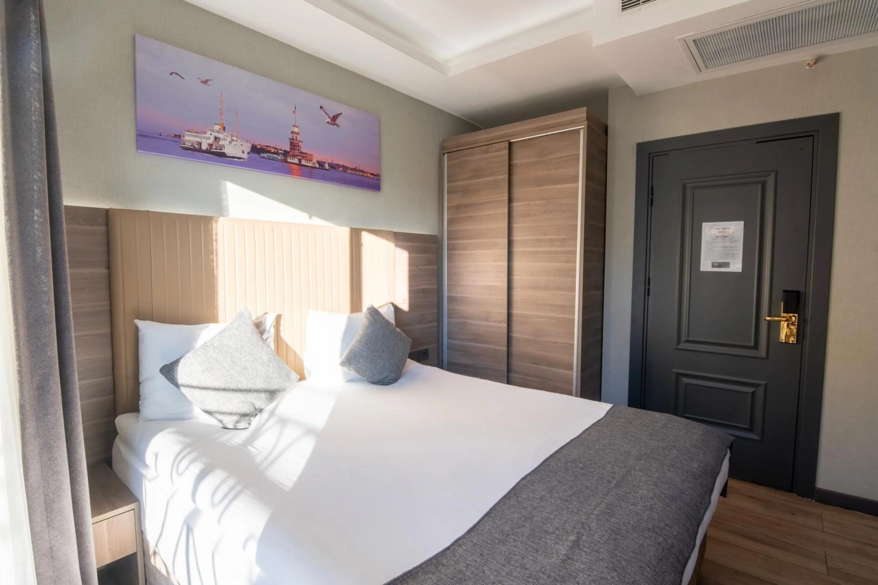 Bed in The Omiya Hotel