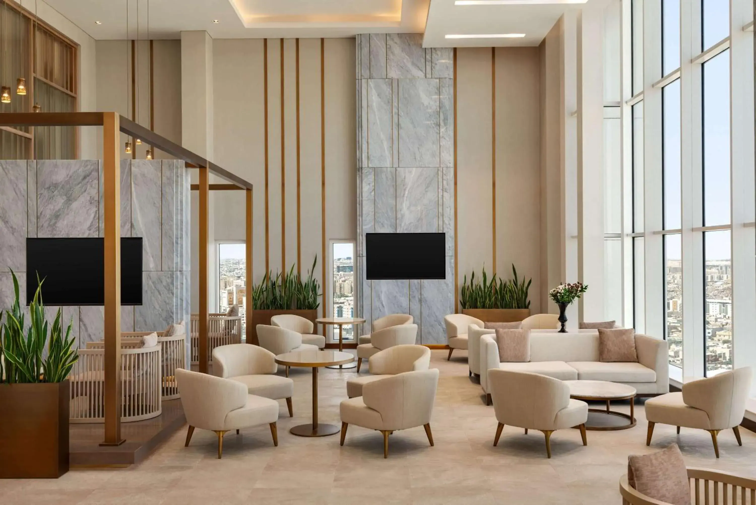 Lounge or bar in Ramada by Wyndham Riyadh King Fahd Road Lounge or bar in Ramada by Wyndham Riyadh King Fahd Road