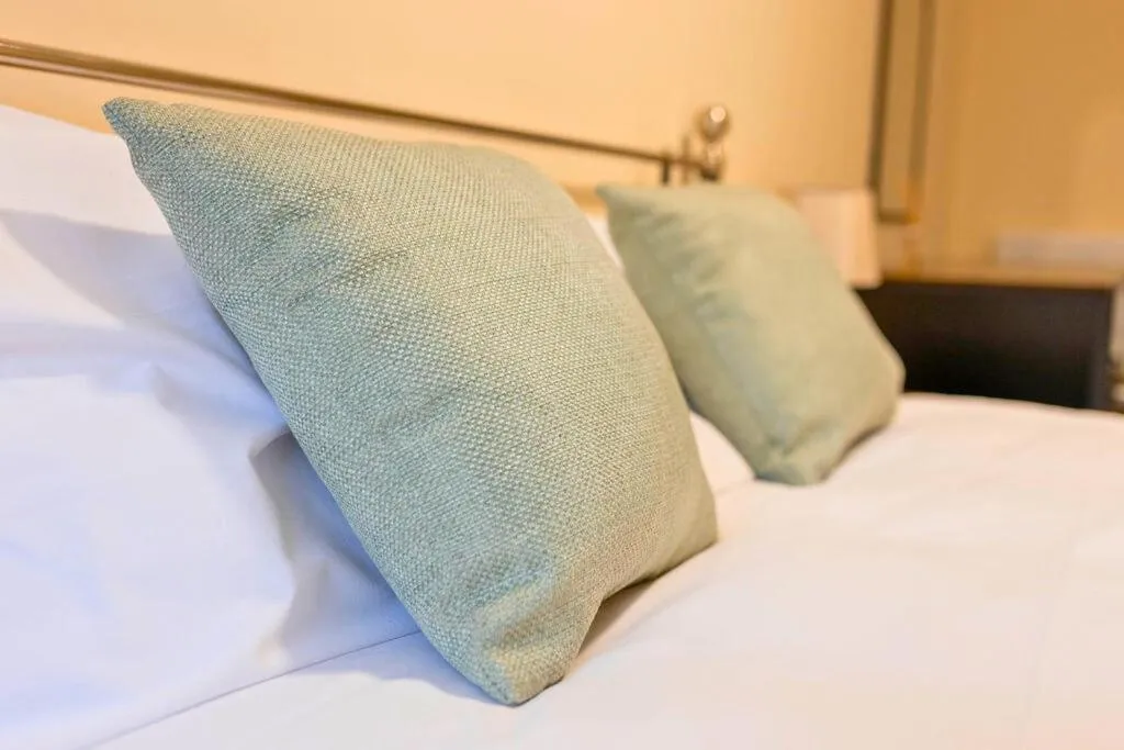 Bed in The Windmill Hotel