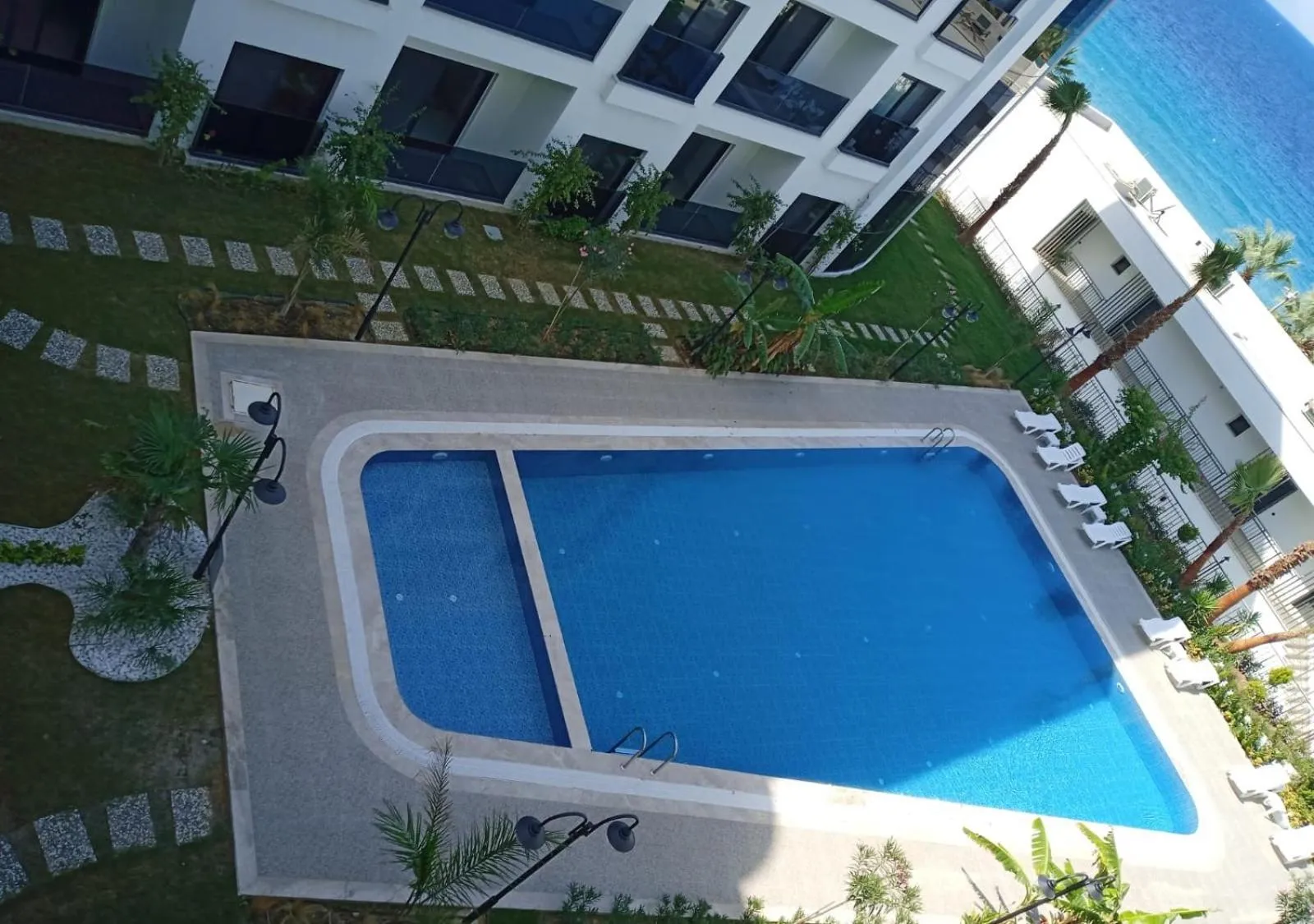 Swimming pool in Ege Birlik Seasight Suites