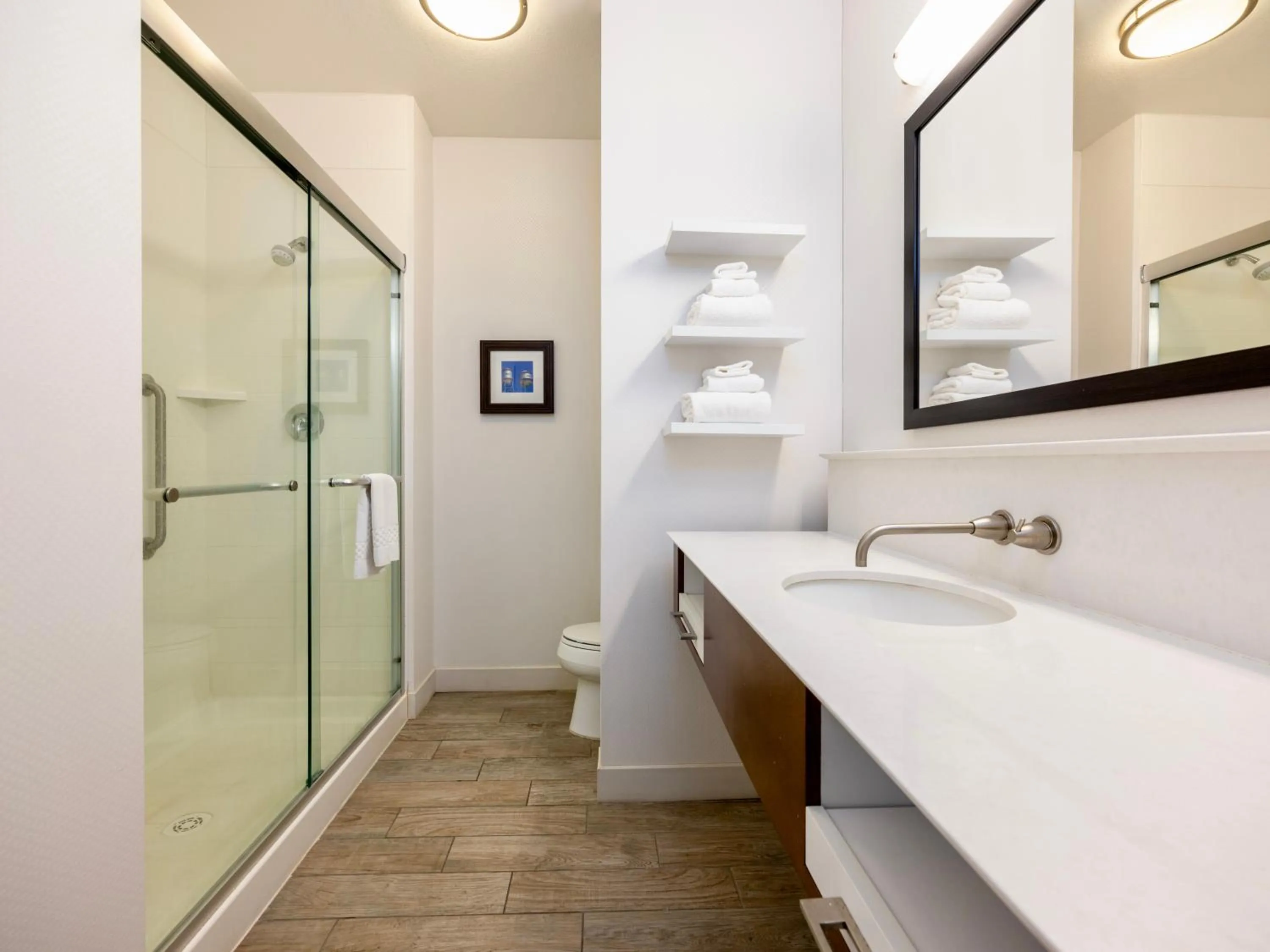 Bathroom in Flag Point Inn and Suites Pratt by FairBridge