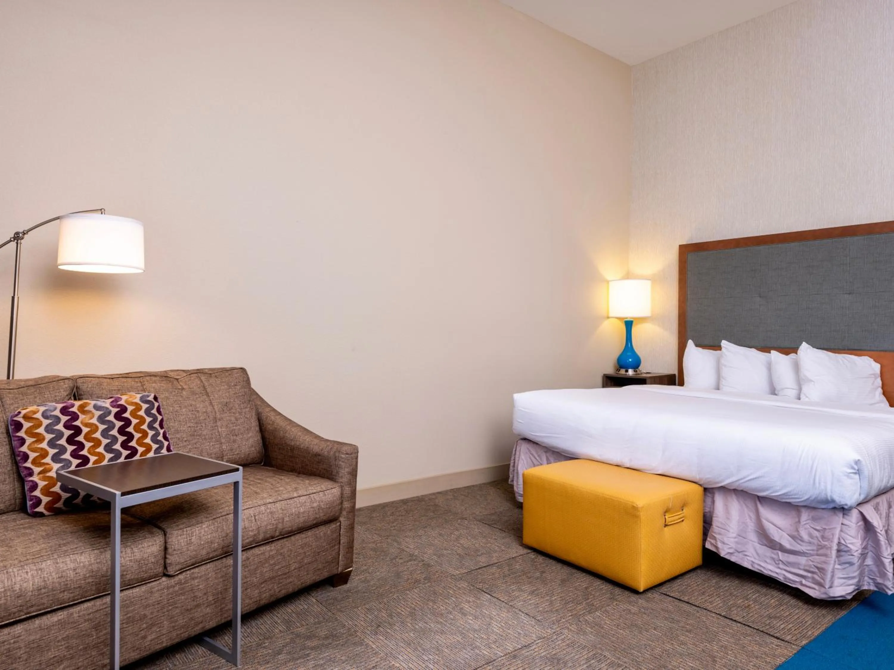 Bedroom, Bed in Flag Point Inn and Suites Pratt by FairBridge