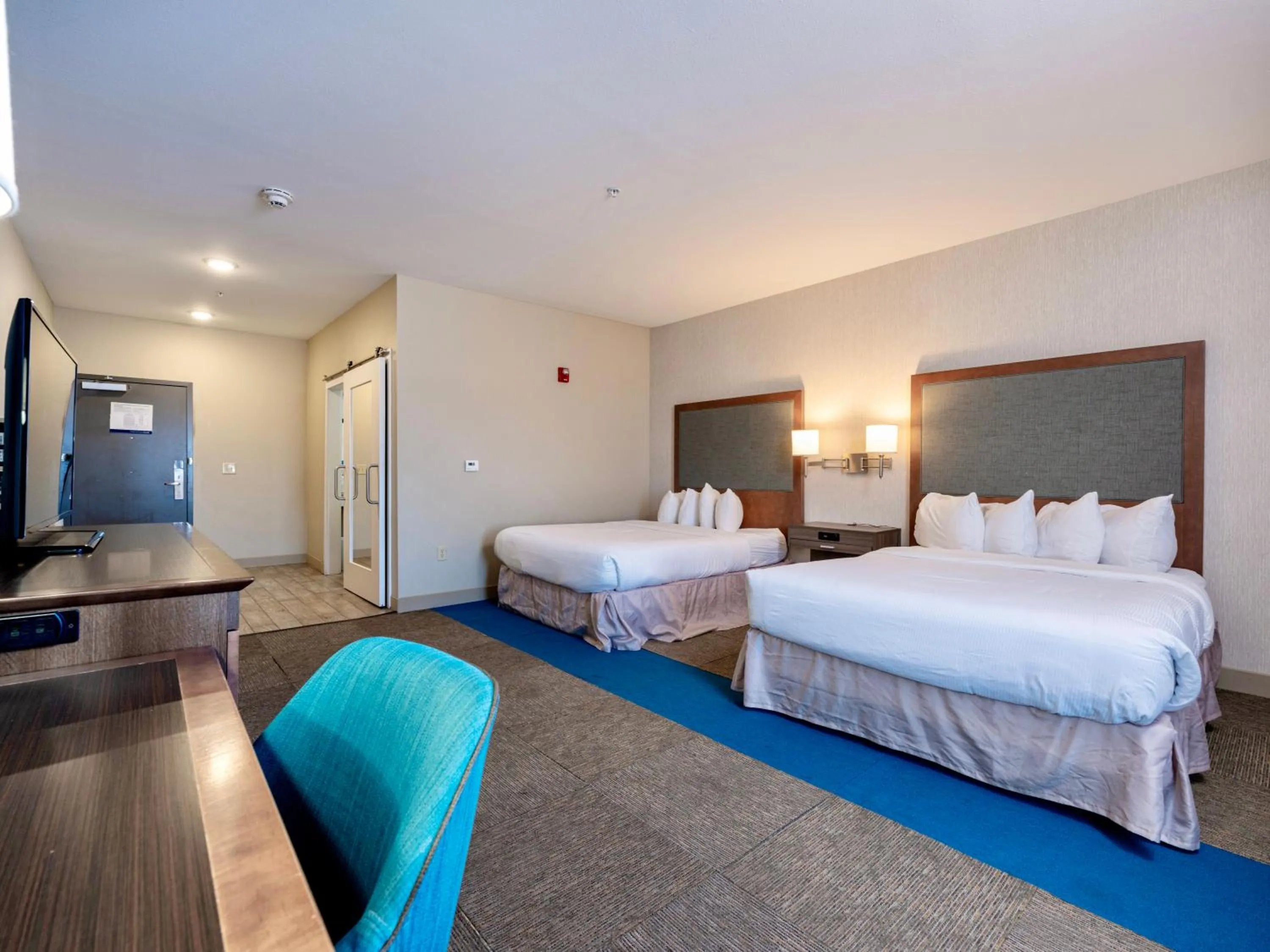 Photo of the whole room, Bed in Flag Point Inn and Suites Pratt by FairBridge