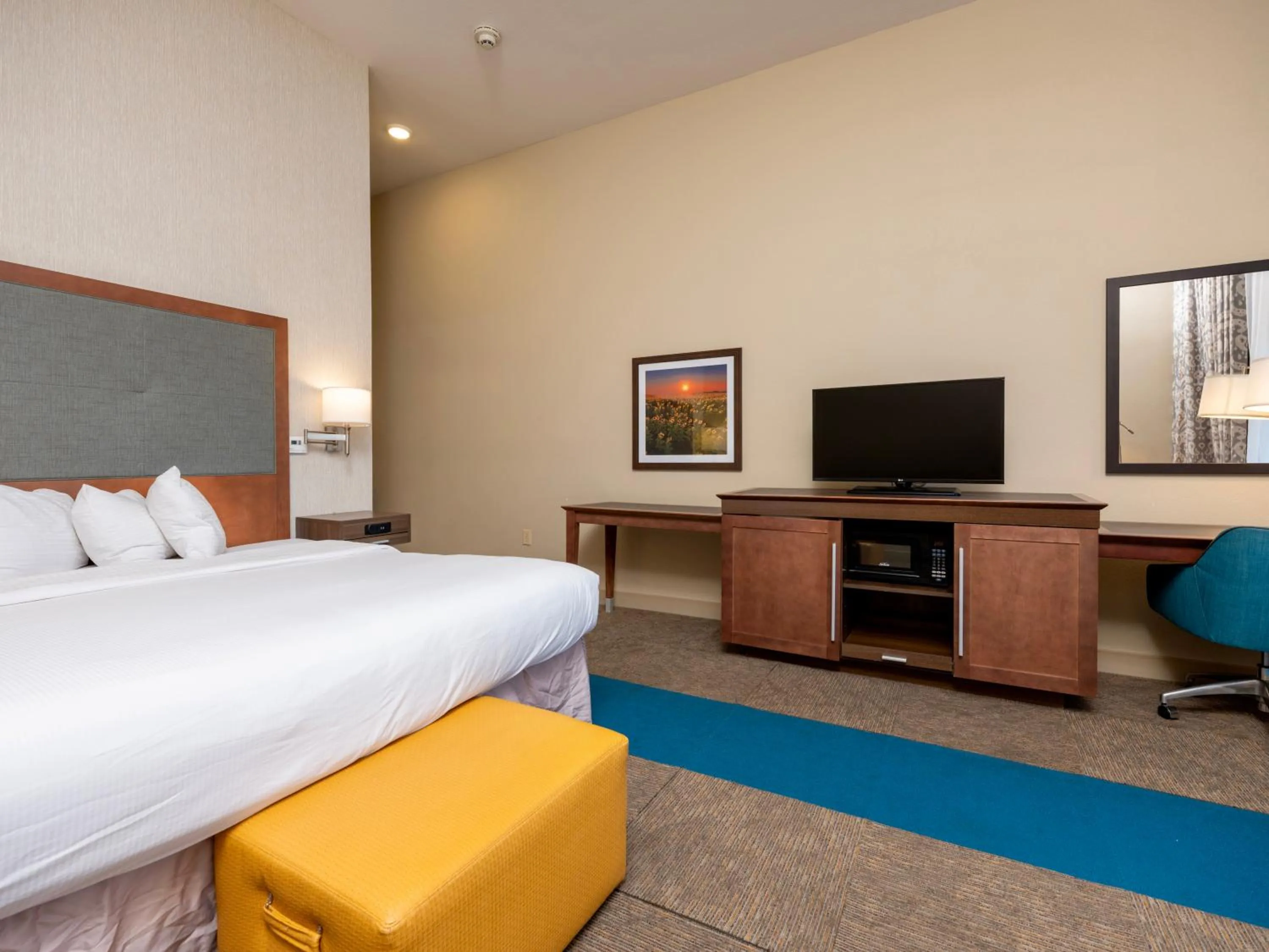 Bedroom, Bed in Flag Point Inn and Suites Pratt by FairBridge