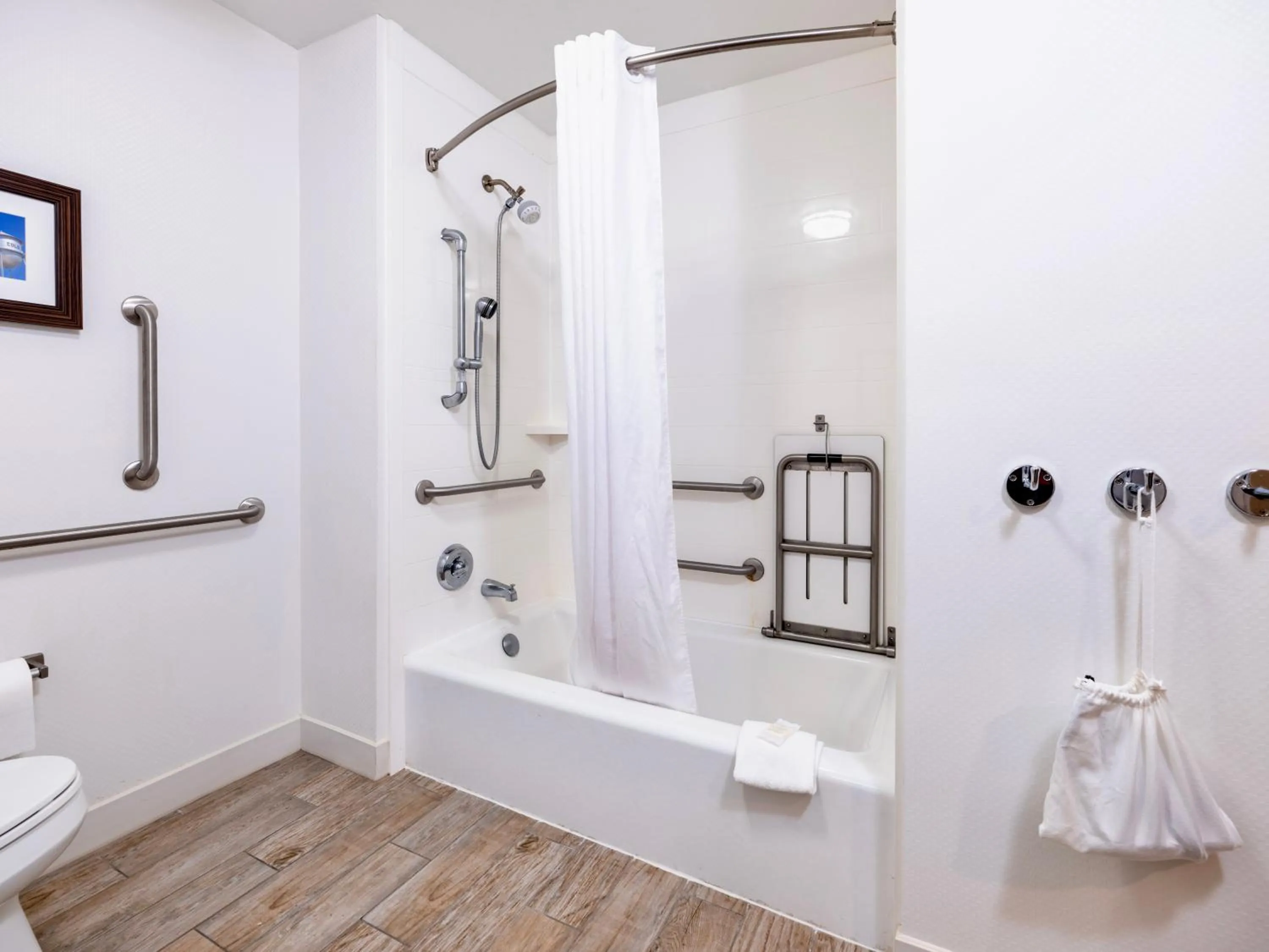 Bathroom in Flag Point Inn and Suites Pratt by FairBridge