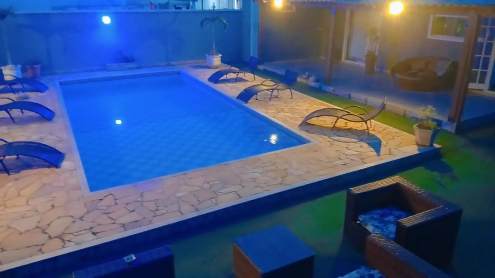 Swimming pool in Pousada Litorânea