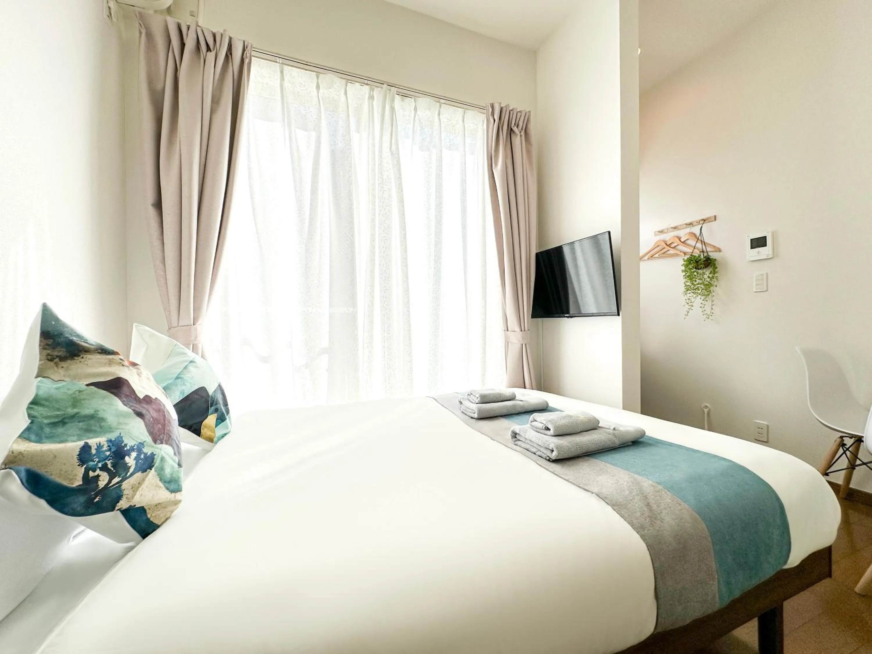 Bed in nestay suite tokyo ikebukuro