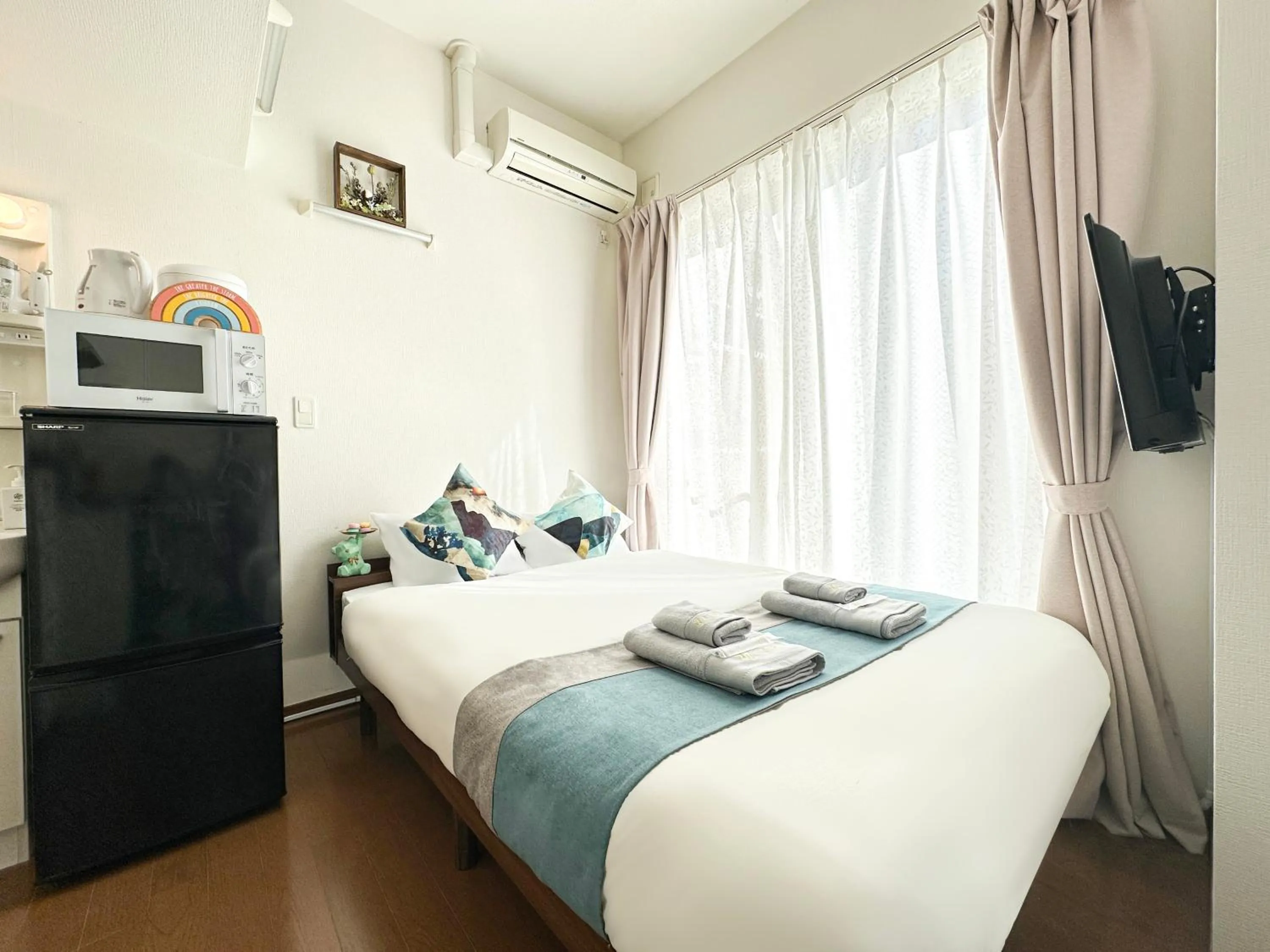 Bed in nestay suite tokyo ikebukuro