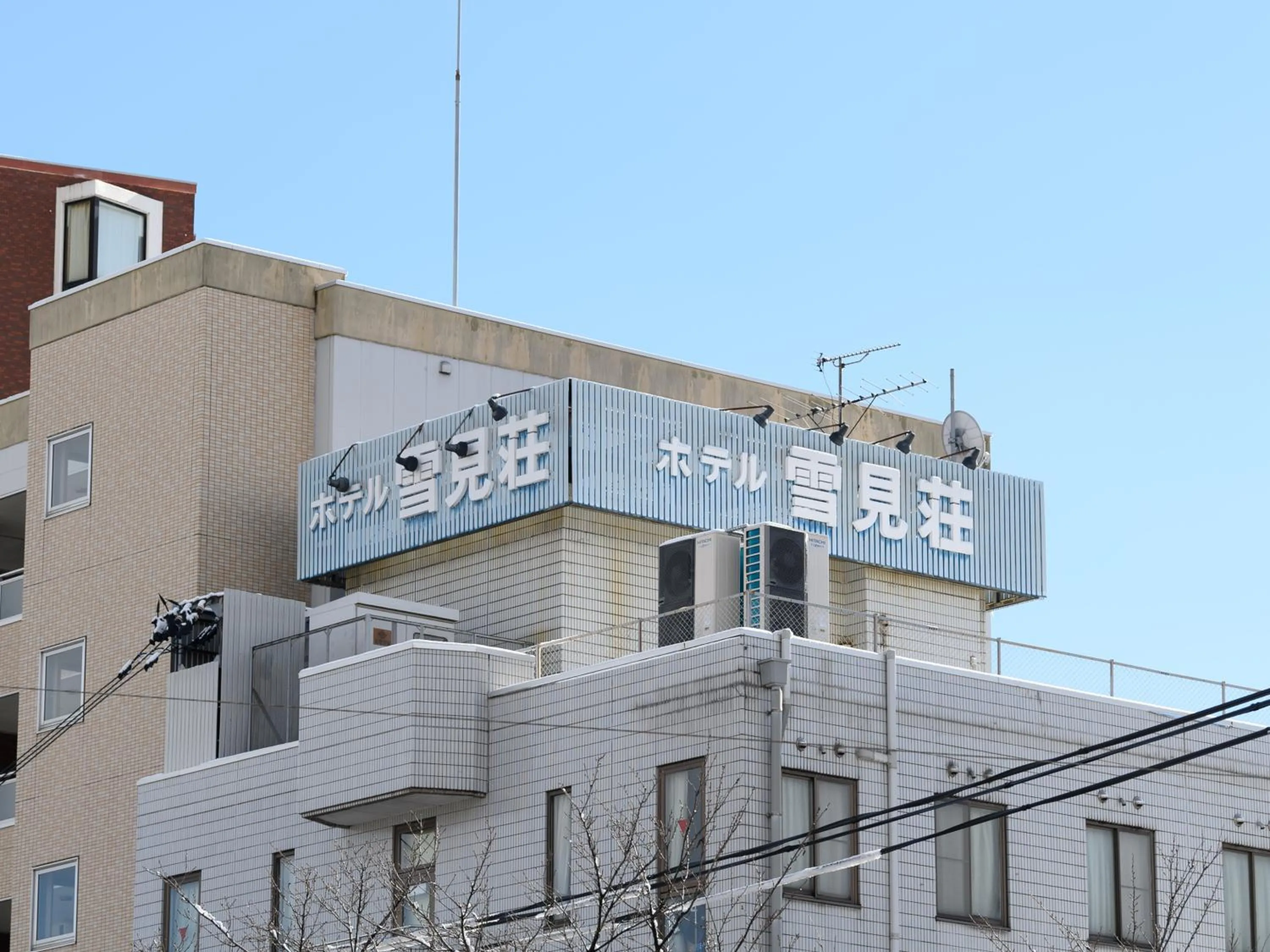 Property building in Tabist Business Ryokan Hotel Yukimiso