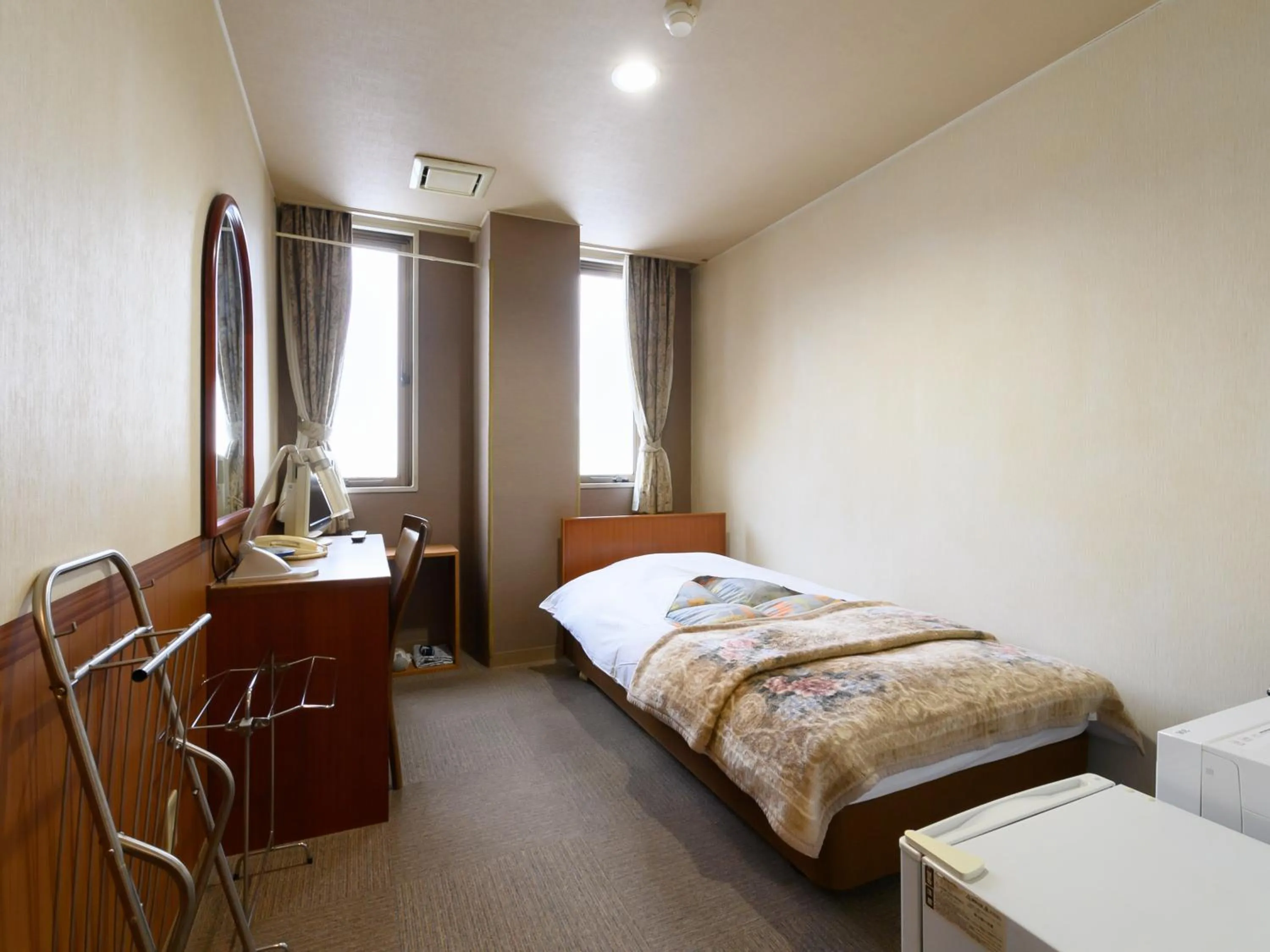 Bed in Tabist Business Ryokan Hotel Yukimiso