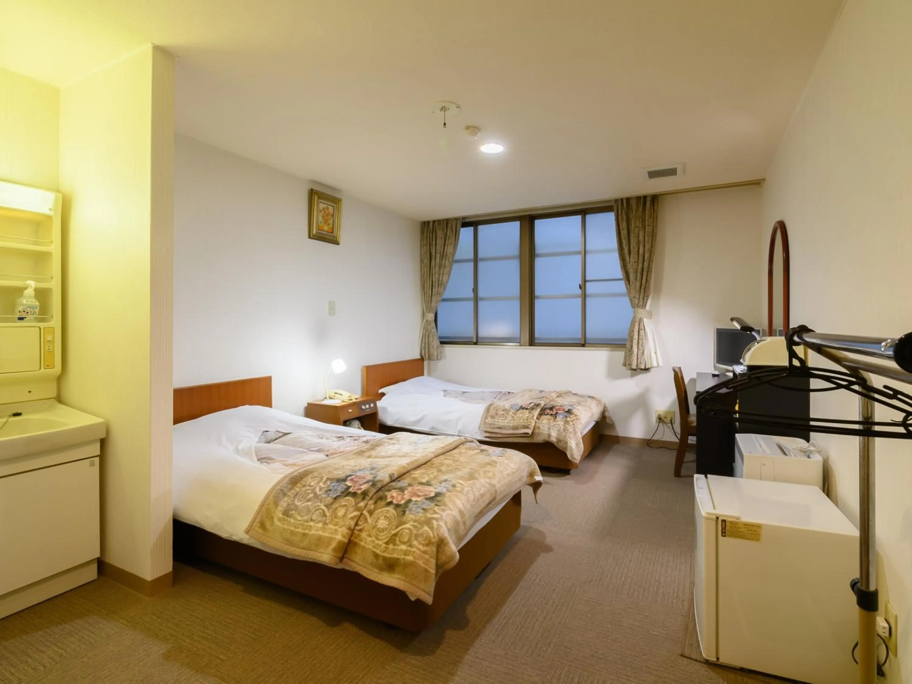 Bed in Tabist Business Ryokan Hotel Yukimiso