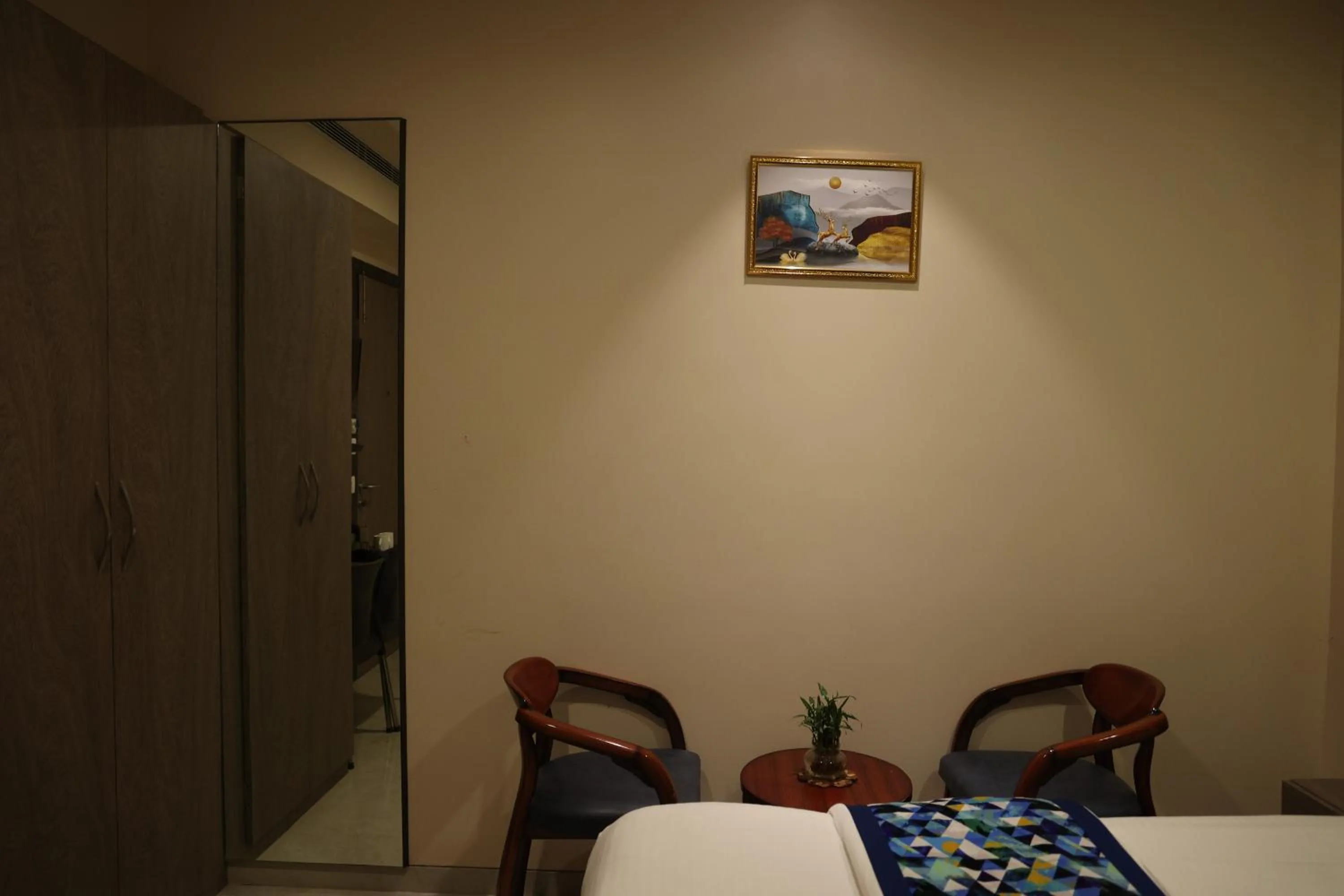 Bed in Hotel Pinaka Inn