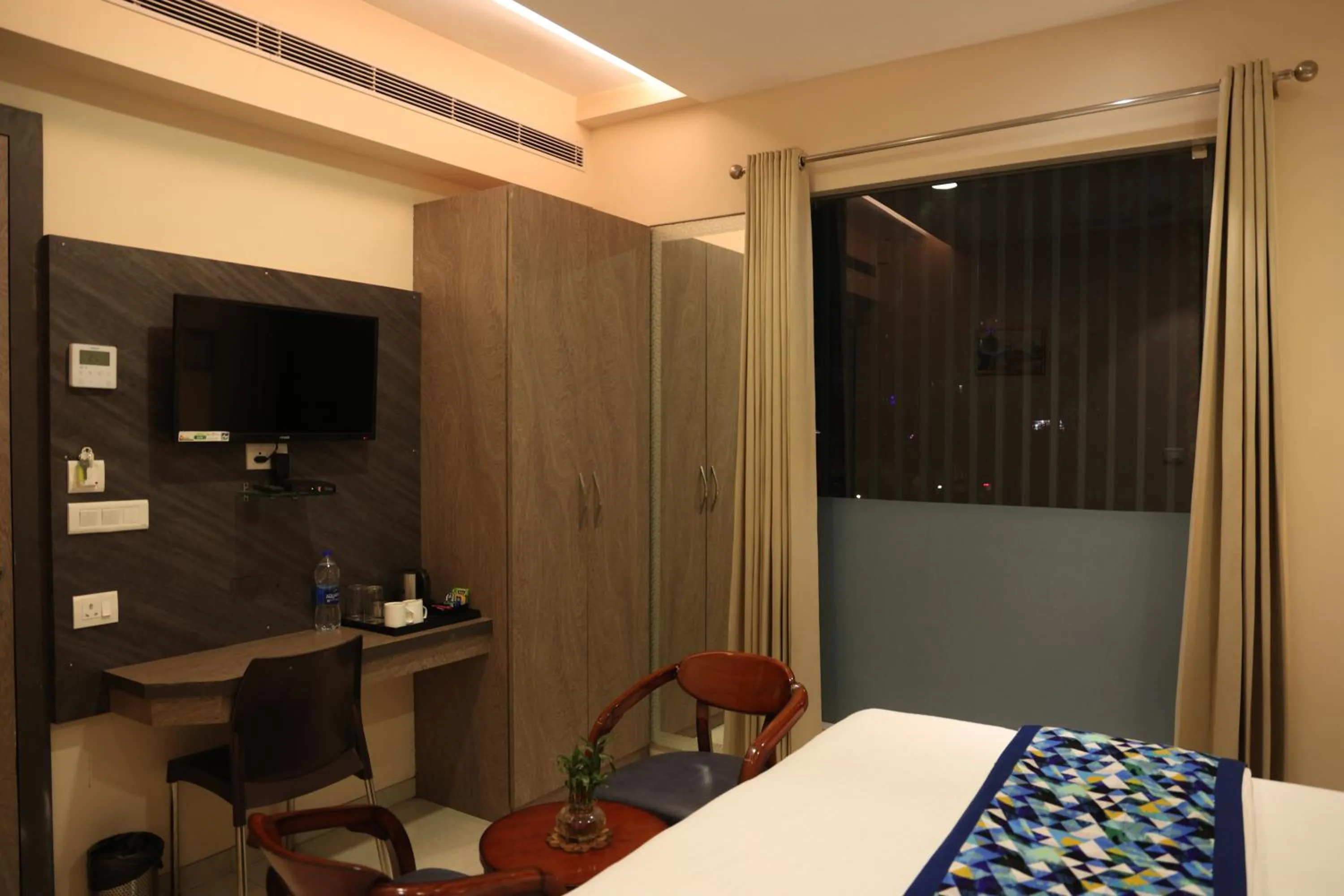 Bed in Hotel Pinaka Inn