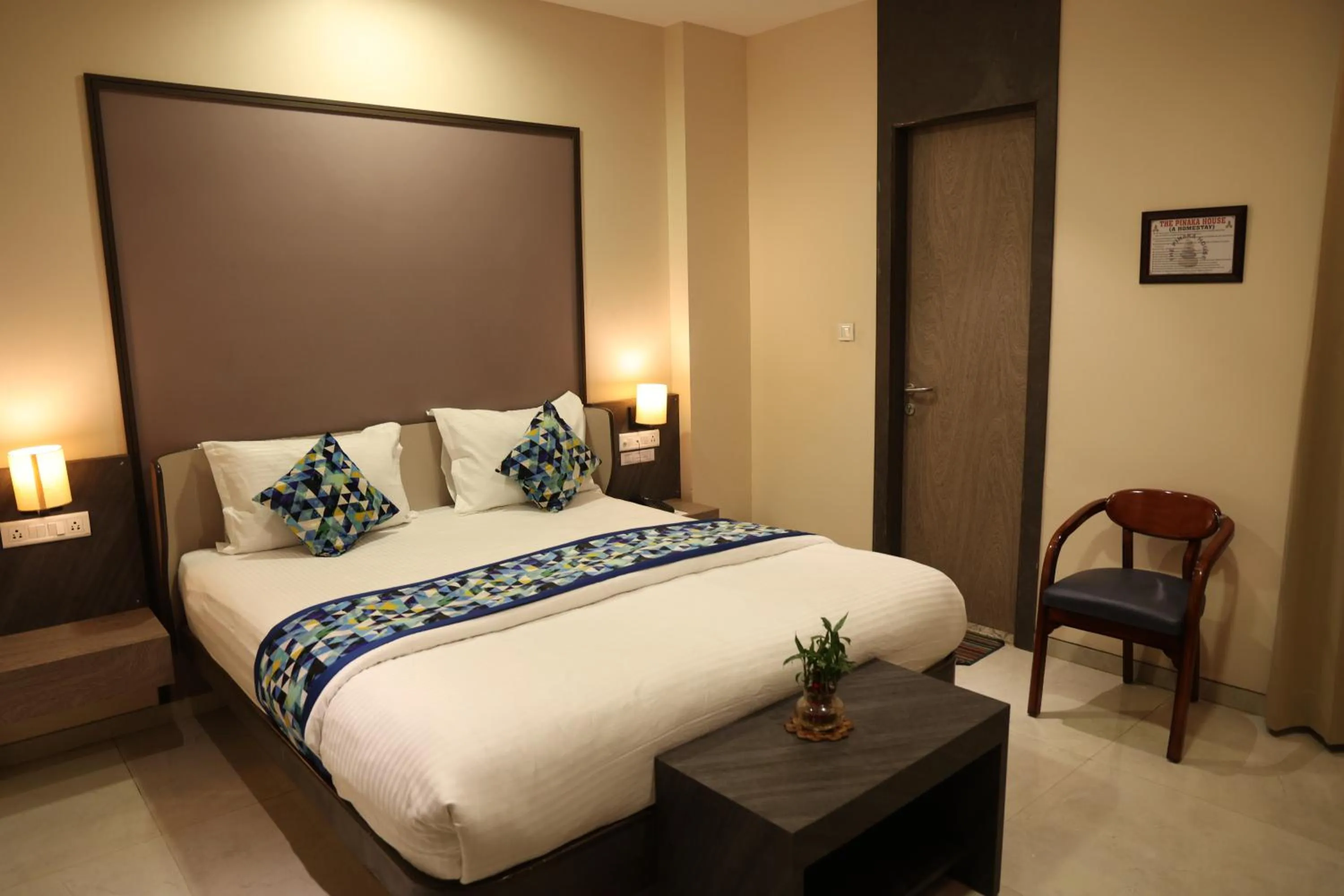 Bed in Hotel Pinaka Inn